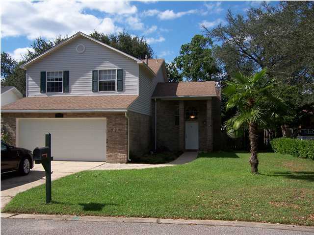 Very nice well maintained home in great location. Walk to Elementary school, shops at Bluewater Bay. Close to Beaches and bases. Entrance way opens to Living room with Gas Fireplace, tile flooring, sliding door opens to fenced backyard and open patio. Off living area is the dining area with tile floorinig. Also tile family area. Well appointed Kitchen with all appliances, breakfast area. Half Bath off hallway. All bedrooms are upstairs. Master Bedroom with Master Bath, Double vanity, separate shower, tub and walk in closet. Other two bedrooms share a full bath. All bedrooms have wood flooring. Yard building in back and sprinkler system. NON SMOKINIG UNIT. NO PETS.