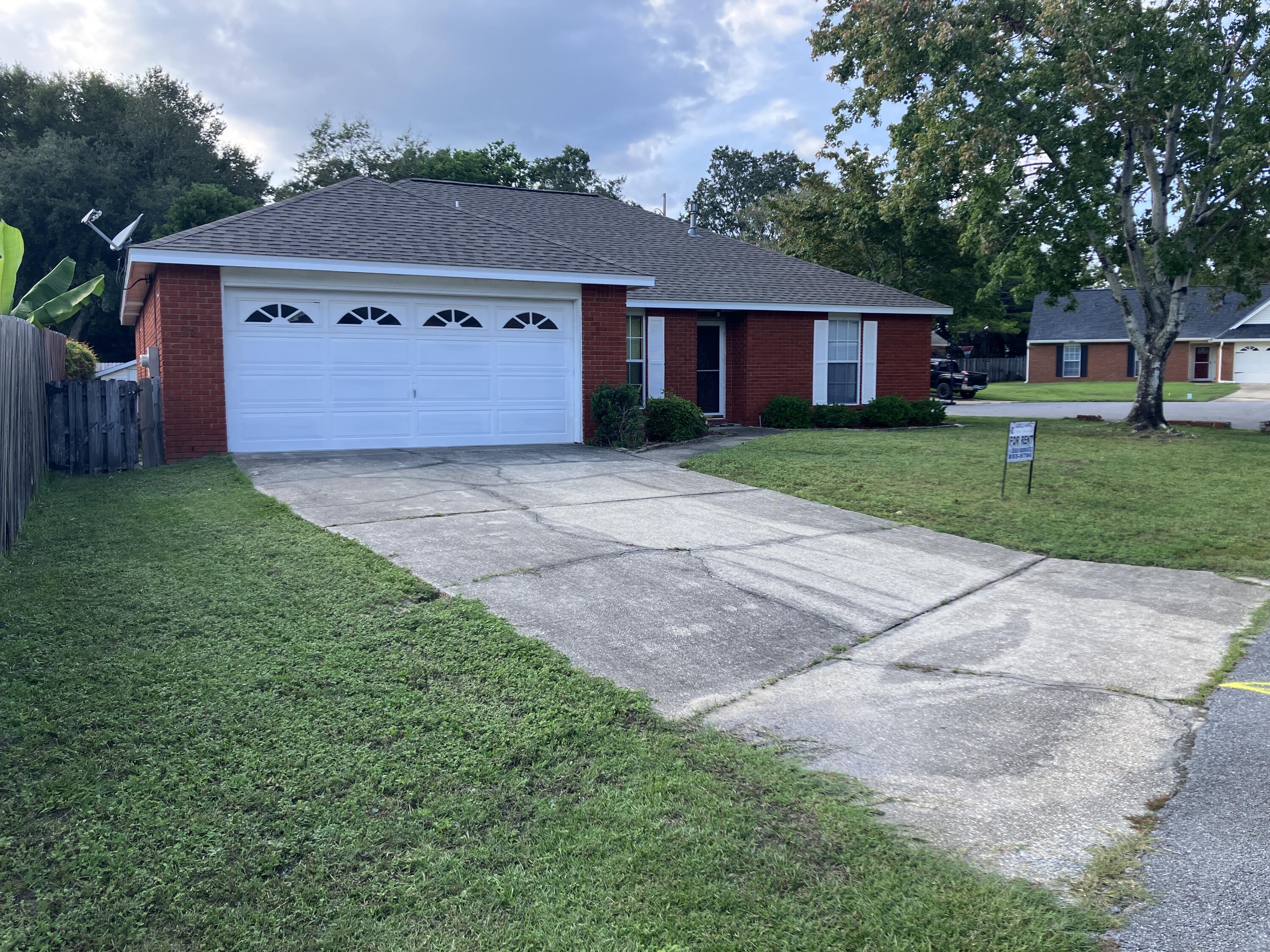 Nice home in Bluewater Bay.  Walking distance to the Bluewater Elementary School.  Close to shopping, dining, and other convenient stores.  Desirable split floor plan with a roomy eat-in kitchen, large family room, separate dining area, jacuzzi tub, and standing shower in main bedroom.   Wood flooring in all floors except kitchen and FL Room. Tile floors in kitchen, master bath and guest bath. A breezy 16'x10' heated and cool sunroom leads to the fully fenced yard with automatic sprinkler system. Handy 10'x7', low ceiling yard building for storing gardening tools, toys, etc. Double car garage with attic ladder for extra storage. Separate utility room. Available now.  Sorry, no cats or dogs, no smoking, vaping, or roommates. For more information call listing agent.
