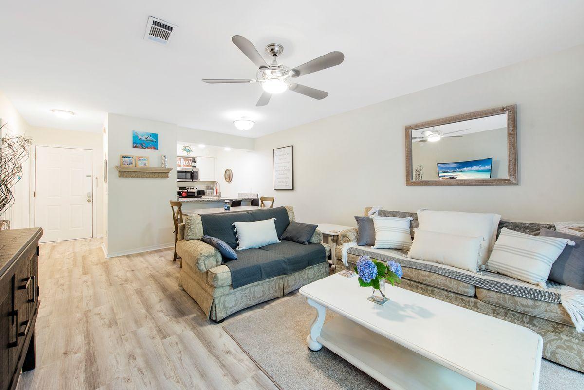 Not many properties can offer a walk to the beach and privacy for such an affordable price, but this cozy townhome in Cassine Gardens hits the mark. It is being sold fully furnished and has upgraded touches throughout. The covered back porch is a great place to relax as it overlooks the Cypress Forest. The community offers two swimming pools, tennis courts, easy beach access, and a nature trail. On the first floor you'll find your living room, dining room, kitchen, and a half bath. Upstairs are the two bedrooms and the full bath. This is a great option for a 2nd home, or could also be a strong producing rental property. In the heart of Seagrove Beach you have plenty of restaurants and shops at your fingertips. Enjoy being right in the middle of everything Scenic 30A has to offer while feeling completely secluded at the same time.