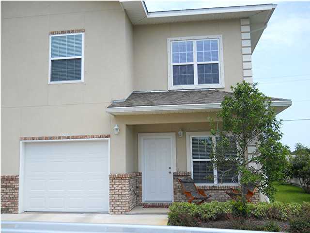 OPEN THE DOOR TO PRESTIGE AND ELEGANCE! THIS ATTRACTIVE 2 STORY, SPLIT FLOOR PLAN LOFT, BRICK/STUCCO, 3BD/2 1/2BA END UNIT TOWN HOME IS JUST WHAT YOU'VE BEEN WAITING AND LOOKING FOR. PERFECT LOCATION FOR SHOPPING, BEACHES, AND SCHOOLS. ALTHOUGH IT'S CONVENIENTLY LOCATED BETWEEN BOTH BASES, IT RIGHT OUTSIDE HURLBURT FIELD AFB BACK GATE. IS MOVE-IN READY! NOTE THE TOUCH OF CLASS THROUGHOUT THE HOME. AS YOU ENTER,THE BEAUTIFUL TILE FLOORING IN THE MAIN LIVING AND WET AREAS, GOURMET ISLAND KITCHEN EQUIPPED W/ALL STAINLESS STEEL APPLIANCES, GRANITE COUNTER TOPS, AN ARRAY OF CABINETS W/AMPLE COUNTER SPACE. FORMAL DINING ROOM JUST RIGHT FOR CANDLELIGHT, AN ELEGANT SETTING FOR THE HOSTESS WHO PREFERS FORMAL ENTERTAINING. THE MASTER SUITE, HUGE!!! WITH BUILT-IN BOOK SELVES, AND OFFERS A PRIVATE . . PLACE FOR PEACE AND QUITE. HAS A SITTING AREA, AND CUSTOMIZED WALK-IN CLOSET. ENJOY THE SPLENDOR OF THE JACUZZI TUB AND TWO AT A TIME DOUBLE VANITY MASTER BATH. APPLIANCES ALSO INCLUDES STAINLESS STEEL, SIDE-BY-SIDE FRONT LOAD WASHER & DRYER. AND YES, LAWN CARE IS INCLUDED. REALISTICALLY PRICED. COME SEE FOR YOUR SELF. DON'T HESITATE, CALL TODAY. SORRY, NO SMOKING, NO PETS.