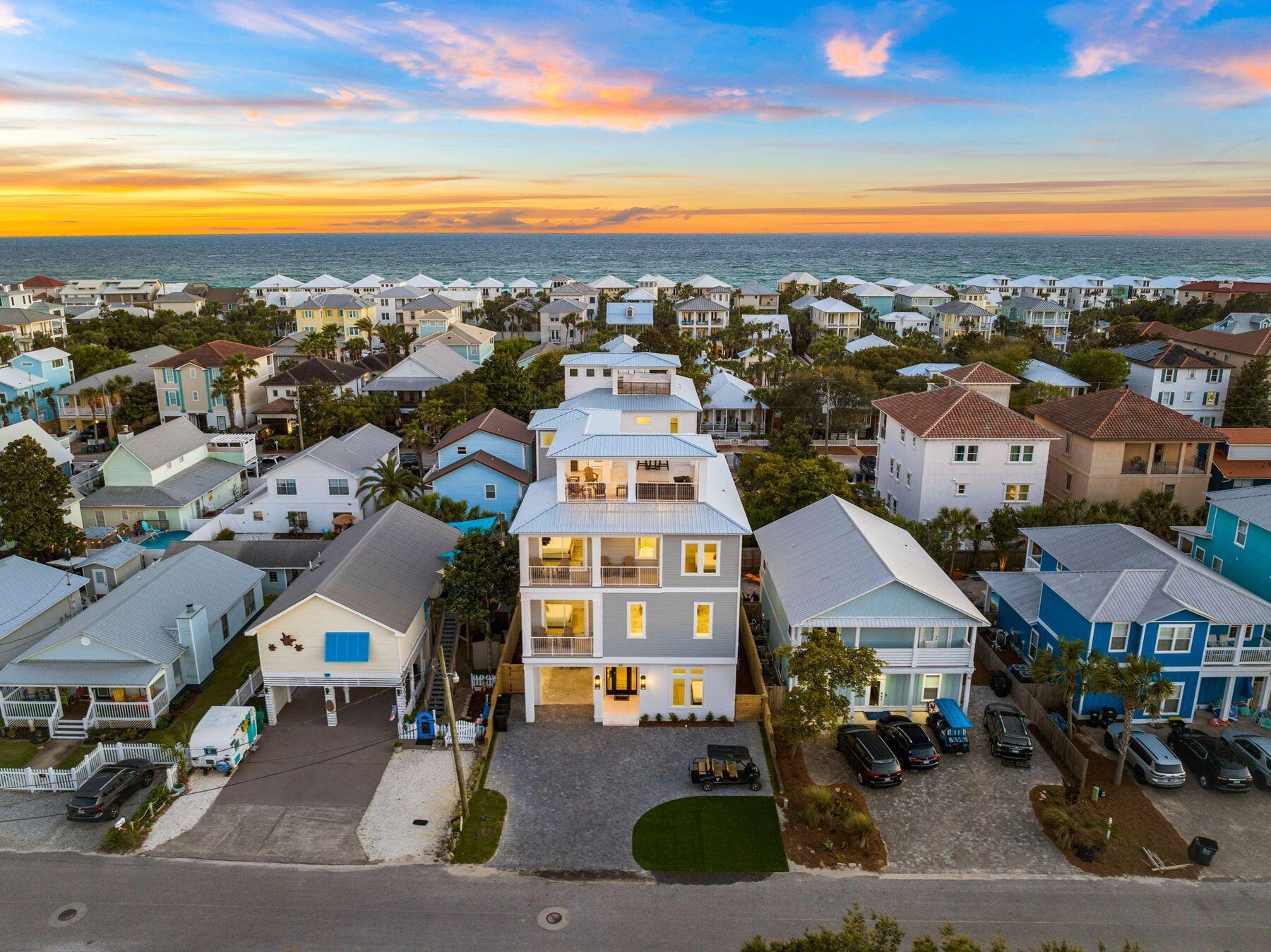 Step into the pinnacle of coastal sophistication at Frangista Beach, where a stunning new build awaits with exclusive, low-density, deeded beach access and no HOA restrictions. This remarkable property boasts a wealth of features sure to captivate discerning buyers. With its nine bedrooms spanning three elevator-accessible floors, culminating in a fourth-story sun deck boasting panoramic gulf views, this residence promises both luxury and investment potential in the heart of Frangista Beach. Spanning 4,832 square feet of interior space and approximately 7,760 square feet total, including outdoor amenities, this home is meticulously designed to cater to the most sophisticated guests. From premium exterior finishes to tile flooring, every detail has been carefully considered. Custom wood shelving adorns the closets and pantry, while shiplap walls and individual sconce lights lend character to the bespoke bunk rooms. With ceiling heights ranging from 10 to 12 feet on each floor and ample windows throughout, the living spaces are bright and spacious, perfect for both relaxation and entertainment. The top floor lookout area offers a serene spot for cocktails and sunset gazing. The kitchen is a chef's dream, featuring top-of-the-line appliances including a 48-in. Wolf dual-fuel gas range, three Fisher & Paykel refrigerator/freezers and a Bosch combination oven/microwave. Shaker-style cabinets, a spacious island and a Venetian plaster custom hood add to the allure, while practicalities are addressed with three dishwashers, two ice makers, three under-counter beverage refrigerators and two tankless water heaters. The bathrooms all boast elegant finishes and sleek quartz countertops, while outdoors, the private oasis continues with a shaded lanai, multiple balconies and a sprawling travertine deck surrounding the heated saltwater pool with LED lights, three deck jets and a raised spa. Whether hosting gatherings or seeking quiet retreats, this space offers endless opportunities for relaxation and enjoyment. A spacious garage provides ample storage for beach essentials, bikes and water toys. This property is offered fully furnished, including all indoor and outdoor furniture & accessories, 15 TVs, window treatments and a fully stocked kitchenready for immediate occupancy or to serve as a lucrative income-producing asset. Nestled in the sought-after first addition of Frangista Beach, this property offers the quintessential beachfront lifestyle without the constraints of an HOA, inviting residents and guests to experience the beauty and comfort of coastal living at its finest.