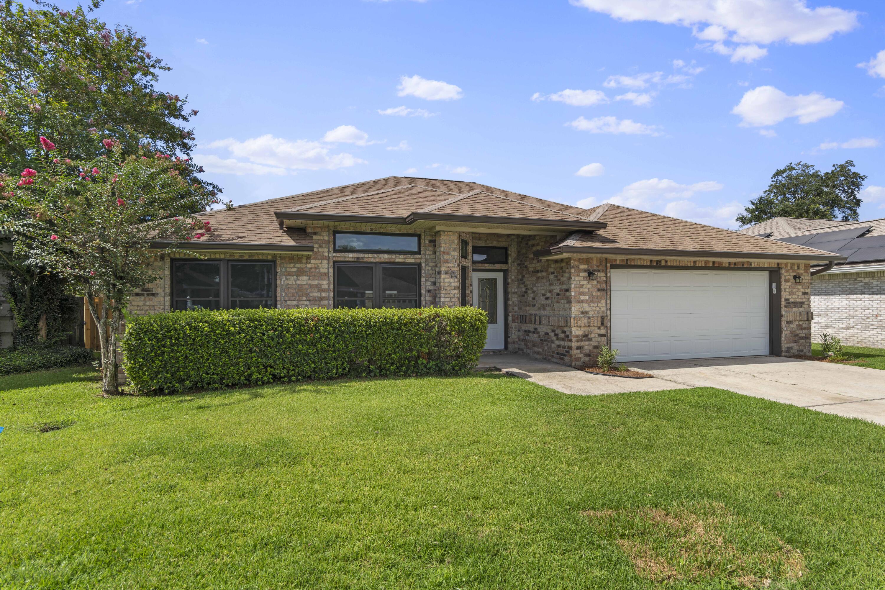3 bed/2 bath brick home on a cul de sac.  Centrally located in the Northridge Creek Subdivision and is just a short distance to the bases, beaches, restaurants and more. Spacious, open floorplan.  Recently renovated with new windows and LVP flooring throughout, done in 2024.  A new hot water was just installed in March, 2025 and a new roof and solar panels were installed in 2020.