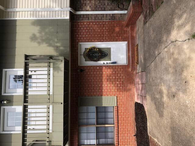 This very large townhome boasts 3 bedrooms and 2.5 baths.  Brand new roof, fresh paint, new laminate flooring and carpet, new vanities, mirrors and faucets, new lighting.  Laundry room.  Room for 3-4 cars.  HVAC is one year old. Great value!!!