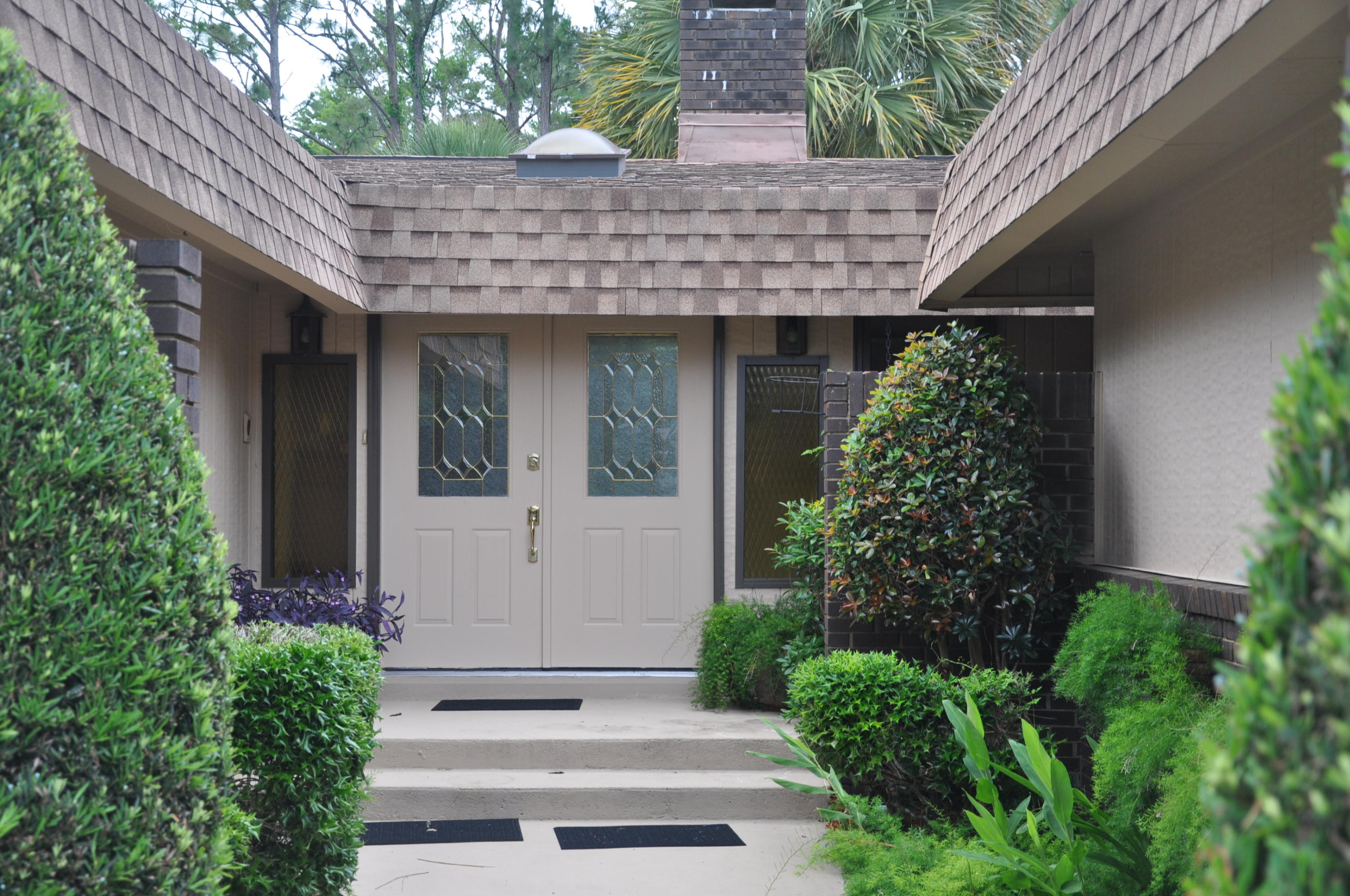 Large home with pool in popular Lake Lorraine. Pleasing front view with side entry garage and deep paver driveway. Just three miles to Eglin Air Force Base, the area's largest employer. Super sized living/dining area with big kitchen too. Cabinets just repainted. Bright inside with tall Anderson windows. Large patio/courtyard in rear including 36 x 18 pool. Nicely landscaped all around. Larger bedrooms with space for desk. Master bedroom features large closet area and larger master bath too!! Privacy as property backs up to Eglin Air Force Base providing open woods scenery. Two HVAC systems and two hot water heaters for living comfort. Pool house addition (with full bath) is plumbed and wired for hot tub, and includes outside entry storage area for yard and pool equipment. Perfect home for entertaining in established and conforming neighborhood.  Close to everything:  medical, shopping, schools , airport and world class beaches in both Fort Walton and Destin.