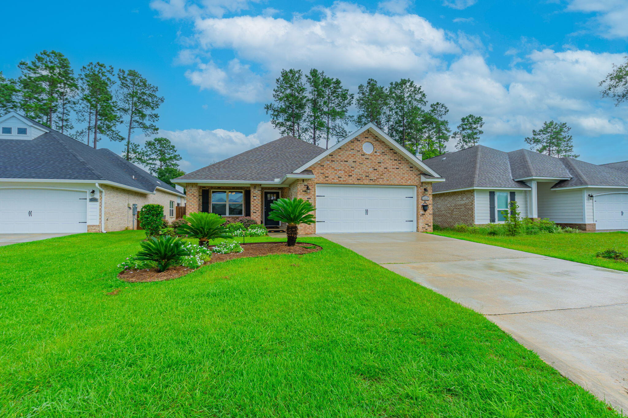 ASSUMABLE VA loan at the low rate of 2.75% offered to qualified VA buyers and the SOLAR panels will be PAID OFF by sellers. This immaculate, like new and beautifully maintained, one story home is in the desirable gated  subdivision of Stonechase, just steps away from the community park. Built in 2022, by Celebrity Builders, this Gaslight floor plan blends modern amenities with thoughtful design and attractive finishes. A welcoming covered front porch leads into the entry foyer with a formal dining (or office) area opening up to the spacious, vaulted-ceiling Great room. The well-appointed kitchen features new Quartz countertops, a breakfast bar, pantry and stainless steel, Energy Star® appliances. A generously sized Primary Suite features a spa-style ensuite bathroom with a double granite topped vanity, large shower and roomy walk in closet. Two additional bedrooms down the hallway, share a full guest bathroom. French doors lead to the covered back patio and the pretty, professionally kept yard with sprinkler system, which will make your morning coffee and evening cocktails a pleasure! The Solar panels, which the seller will pay off -  will give you BIG savings on your power bill year-round, whilst whole home Gutters, Fabric Hurricane shutters and a two-car garage with finished Epoxy flooring complete the package. This home offers an excellent combination of modern design and energy-efficient comfort and a quiet, gated-community in the highly rated PACE School district. Don't miss the opportunity to make this lovely craftsman home your own.