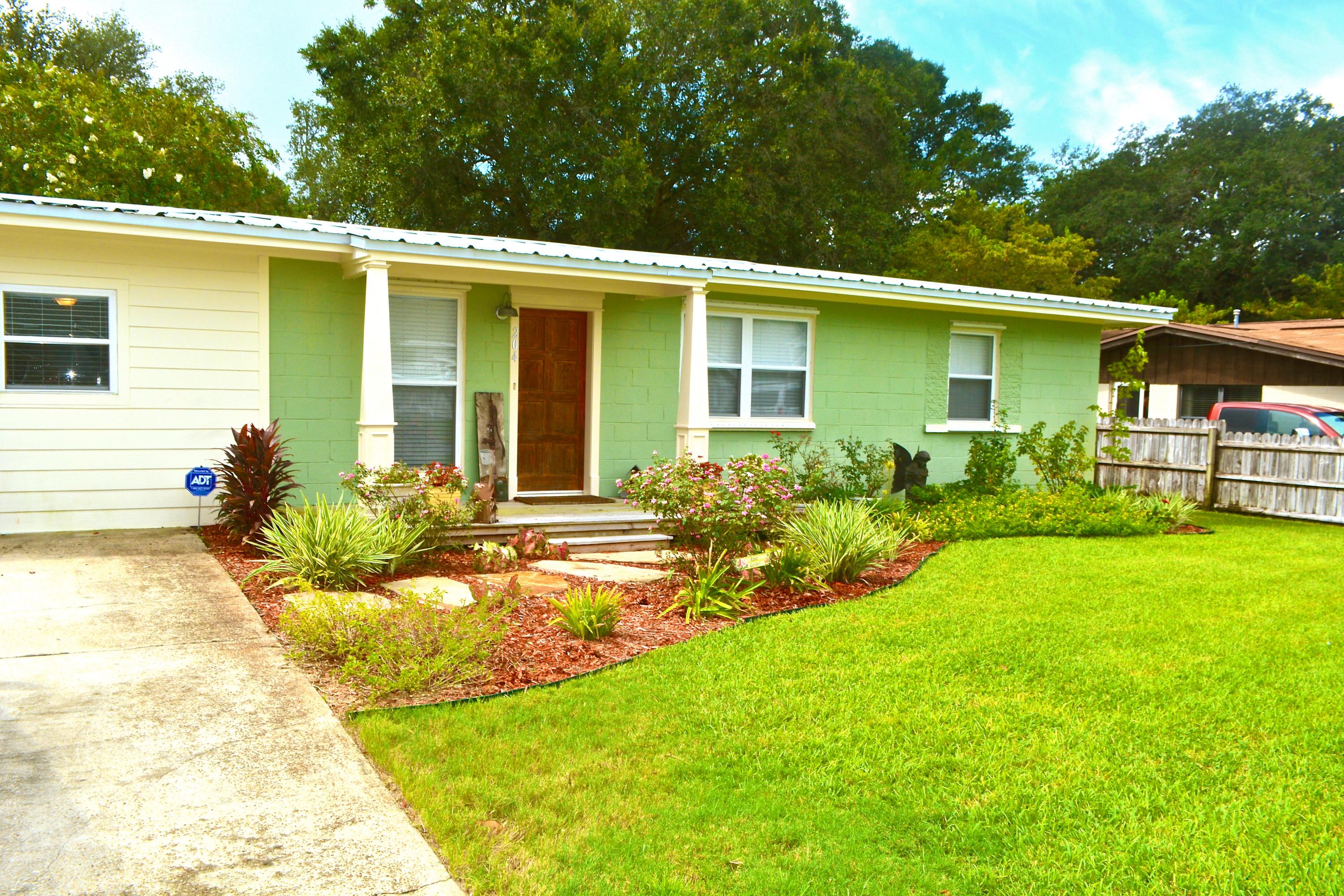 COMPLETELY RENOVATED ADORABLE FLORIDA COTTAGE! This Home has so much to offer both inside & out! The Kitchen has been completely updated w/New Cabinets, Beautiful New CounterTops, Glass Tile Backsplash, Stainless Steel Appliances & New Tile Floors! This Cozy Home also features: Gorgeous Hardwood Flooring throughout the home in all Bedrooms & Living Area, Bathroom Areas have NEW TILE, New Interior Doors, New Crown Molding, New Blinds, New Lights & New Ceiling Fans! The owner didn't forget about the exterior of this home either-Exterior updates include: New Metal Roof, New Windows w/Hurricane Panels, Lawn Pump, Sprinkler System, 16x16 Shed with a 16x16 Additional Covered Area, & a Large Deck for Entertaining! Gas Hot Water Heater & HVAC are 5 years old! This QUALITY home will not last long!!