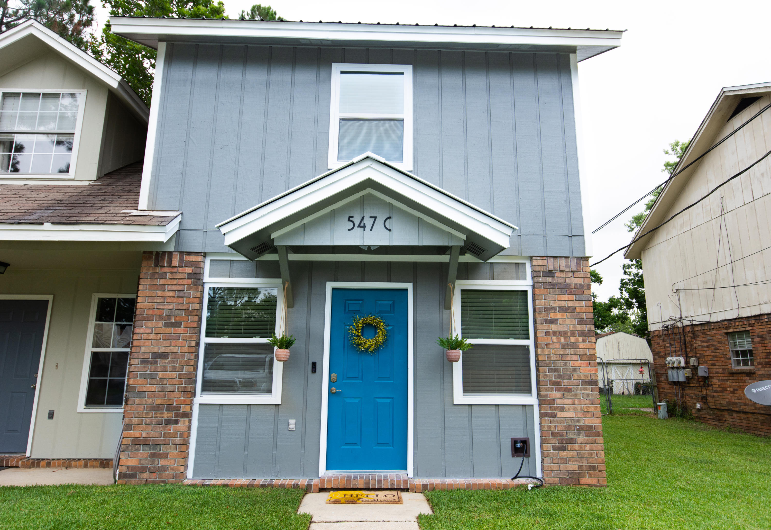Meticulously maintained with modern details, this home 2 bedroom, 1.5 bathroom townhouse is sure to wow you! This home has been newly updated with everything from floors to stainless steel appliances to an electric fireplace. Complete with a large deck and backyard area for pets and entertaining, this is an impressive house, both inside and out.