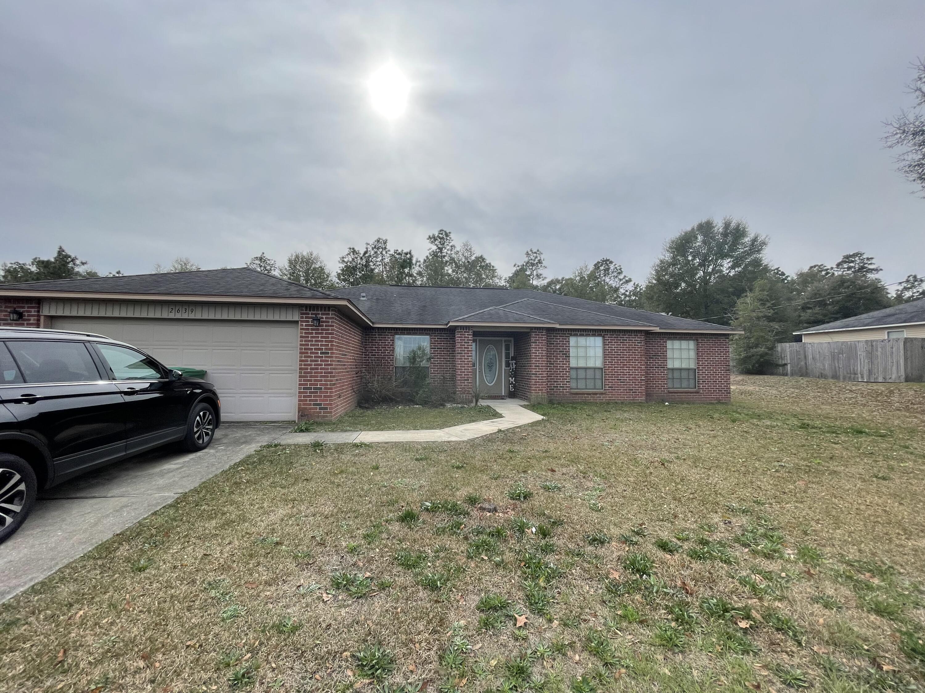 Built in 2009, 4bedroom 2bath on over 1/2 acre. All brick with 2 car garage.