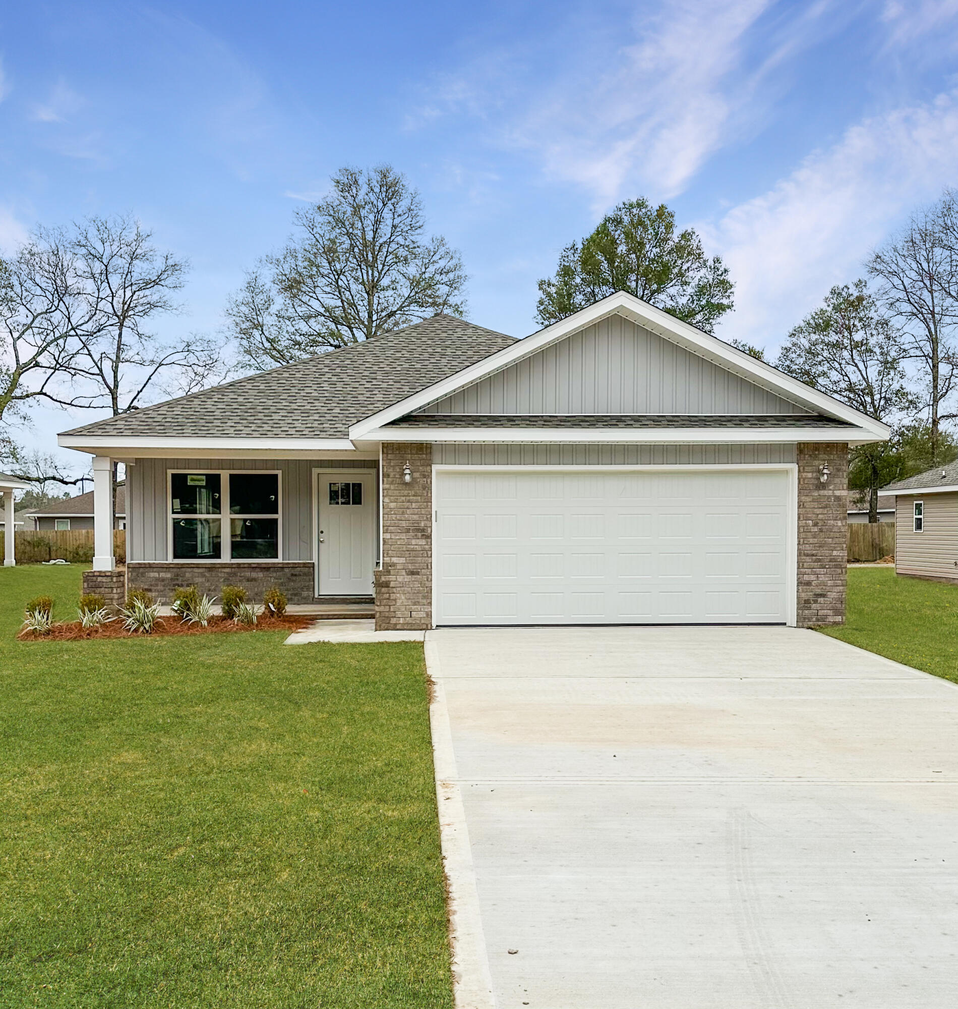 This brand new home is now complete. No Homeowners Association Fees. Low County Taxes. The builder offers a TEN year structural warranty and a 2 year systems warranty.
Three bedrooms, 2 full bathrooms.  Laminate Flooring Throughout. NO Carpet. White shaker cabinets throughout and quartz countertops. Bedrooms have ceiling fans. Two car garage with opener.