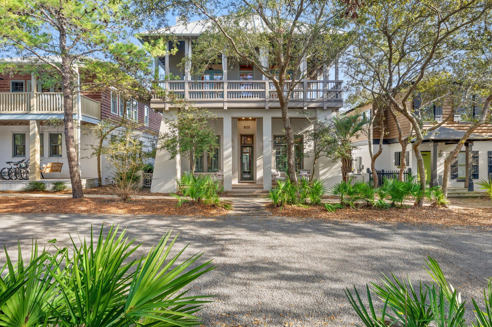 Producing over $250K in actual rental income for 2022 & with over $192K YTD for 2023, 313 East Water Street is a top rental investment property in Rosemary Beach. Located on south side of 30A, this stunning four bedroom home is an entertainer's dream with a private heated pool, hot tub & GULF VIEWS! By the pool, there is a complete outdoor kitchen with a built-in gas grill, granite countertops, ice maker & mini-fridge. And there is a large outdoor fireplace, an amazing luxury for the colder, off-season months. The interior architecture delivers an iconic design. Gorgeous beams are placed throughout delivering the West Indies architecture Rosemary Beach is originally known for. A lovely, wood-burning fireplace is located in the center of the living room. And beyond this space, there is a long balcony overlooking East Water Street. The second level features the kitchen, formal dining space, a full bathroom & an office area. The top floor game room is unforgettable with 4 built in twin beds, a retro arcade system & a foosball table. A big-screen TV is situated perfectly to keep everyone entertained. The top floor balcony delivers GULF VIEWS & a rooftop view of Rosemary Beach. The property is offered fully-furnished & turnkey as a top-producing rental investment property. Rental projections are at $284,000 for 2023. A carriage house has been approved by the HOA!