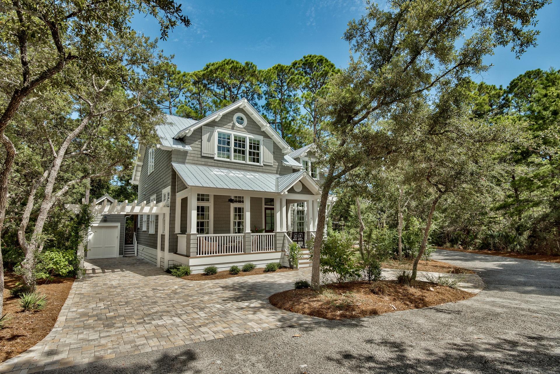 Live in a private gated community surrounded by gorgeous, natural vegetation in one of the best locations Seagrove Beach has to offer off 30A. Located in the heart of it all - steps from our sugar sand beaches on the Emerald Coast. The beach access is within a short walk, and Seaside and WaterColor are easily accessed by foot, bicycle, or golf cart. Entertainment, boutiques, and restaurants abound. Publix WaterColor is down the street on 395. Truly, this location has it all. This home is beautiful inside and out with custom, white Shaker cabinets, 12'' ceilings with 10,000 ft of shiplap walls, designer light fixtures, hardware, faucets, and floors...using only the finest of building materials. Make this 3 BR 3.5 bath your must see! Incredible!