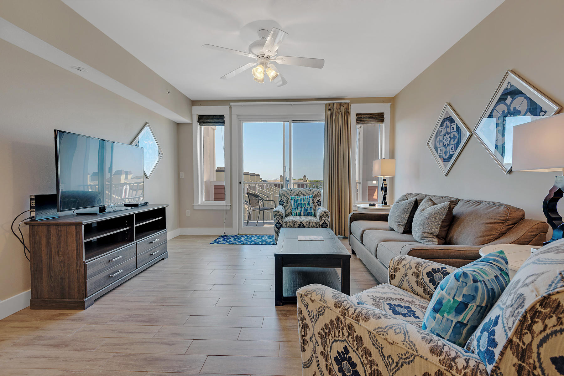 Stunning, updated premier corner condo on the 5th floor with western Bay views and eastern views of the amenities terrace & pool. Brand new granite counters, stainless steel appliances, luxury furnishings, large flat screen televisions in each room, and wood design tile throughout the entire condo. Enjoy a balcony off the living area looking towards the Bay and a separate balcony off the master looking over the pool. A-rated on the Sandestin Rental Program. Owners & guests will enjoy the amenity terrace which boasts a resort style pool, hot tub, fitness center, and a beautiful lawn with a grilling area. Located within the Village of Baytowne Wharf, these residences are perfectly situated for those who like to be front and center; with live entertainment, festivals, shops, and restaurants. As an added bonus and to introduce the new owners to the Sandestin lifestyle, the listing brokerage and seller(s) are offering an incentive package to the buyer(s) of this property: Golf for four on one of our three championship courses, a pass for four to Sandestin's exclusive Beach Club, and an introductory membership to the Burnt Pine Golf Club. Sandestin Golf and Beach Resort is a major destination for all seasons and all ages, and has been named the #1 resort on Florida's Emerald Coast. This magical 2,400 acre resort, comprised of over 70 unique neighborhoods of condominiums, villas, town homes, and estates. The resort features more than seven miles of beaches and pristine bay front, four championship golf courses, a world-class tennis center with 15 courts, 19 swimming pools, a 113-slip marina, a fully equipped and professionally staffed fitness center and spa, meeting spaces and The Village of Baytowne Wharf, a charming pedestrian village with events, shopping, dining, family entertainment and nightlife. For true golf cart community living, Grand Boulevard is just outside the resort gates and provides access to additional shopping, dining and entertainment â€“ all without traveling on Hwy. 98.  Come to Play, Stay for Life!