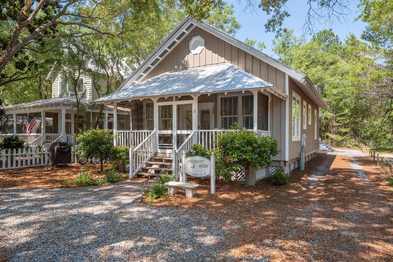 Multiple offers ... highest and best due by 5 PM CST, Sept 15th. Good Night Moon and Bella Luna, a newly renovated, vintage style cottage and carriage house are located in historic Old Grayton Beach.  These two rental machines have combined to have over $185,000 on the books for 2021.   The main cottage features 3 bedrooms and 3 baths (sleeps 7). The separate carriage house features 2 bedrooms and 2 baths (sleeps 4).  Both homes have been professionally designed and decorated.
People-watch from the screened-in front porch, cook out on your gas grill with picnic table in the front yard. Many Oaks and Magnolia trees that have been preserved for shade surround the house.  Walk to 15 different restaurants.  Sold furnished and AS IS.