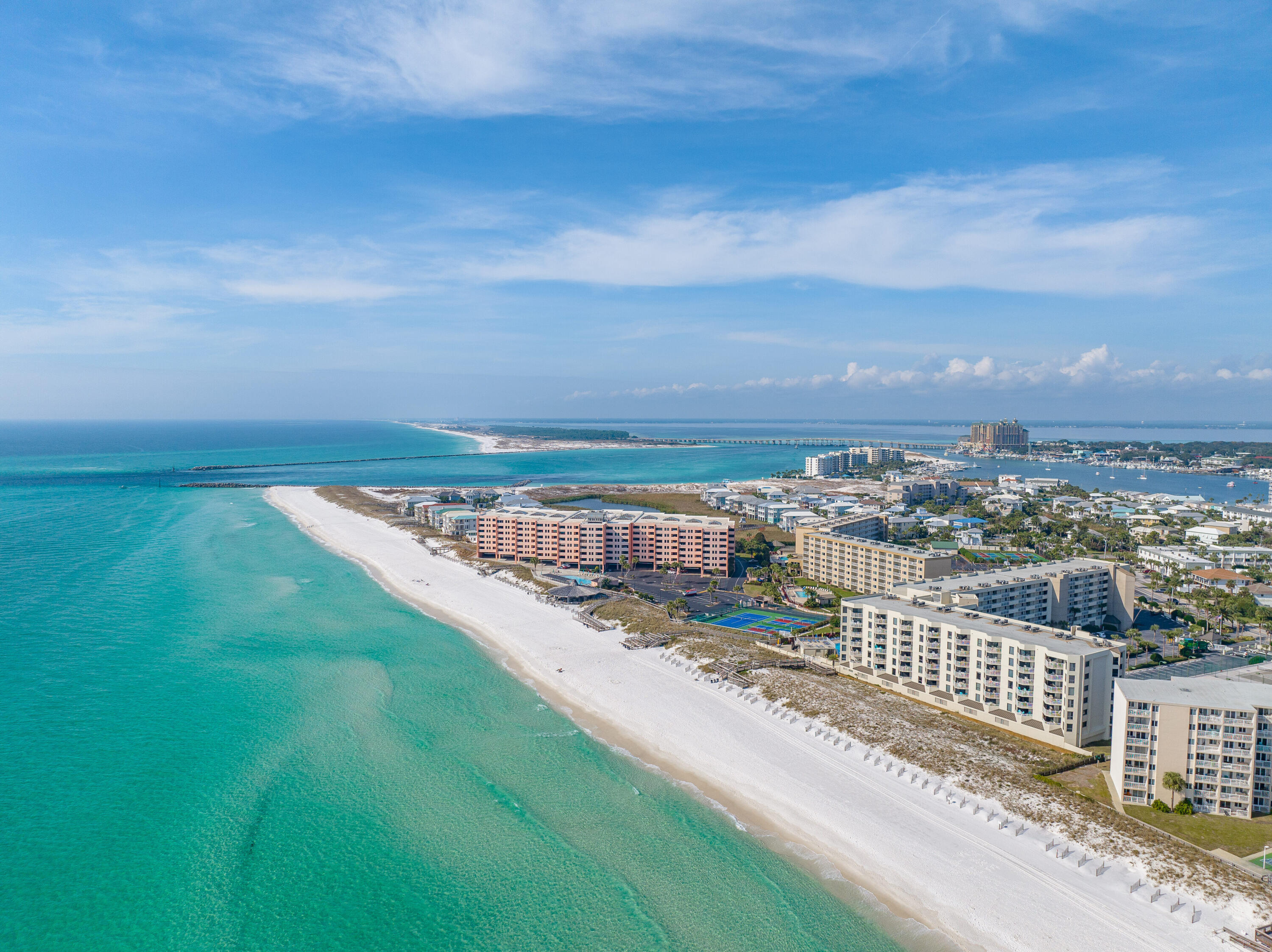 Fully remodeled and absolutely stunning, this condo has been transformed into a coastal dream! The new kitchen features sleek appliances, an ice maker, and a drink fridge—perfect for entertaining. Both bathrooms have been beautifully upgraded with modern fixtures and luxurious finishes. Enjoy stylish touches like new light fixtures, washer/dryer, wet bar, and electric fireplace. Step out onto your spacious balcony to take in beautiful Gulf views! Resort amenities include a Gulf-front pool, beach chair service, NEW pickleball/tennis courts, gym, large owners storage unit, covered garage parking.. even owner boat parking!! Whether for a beach retreat, full-time residence, or turnkey rental, this condo has it all. Don't miss out—schedule your showing today!