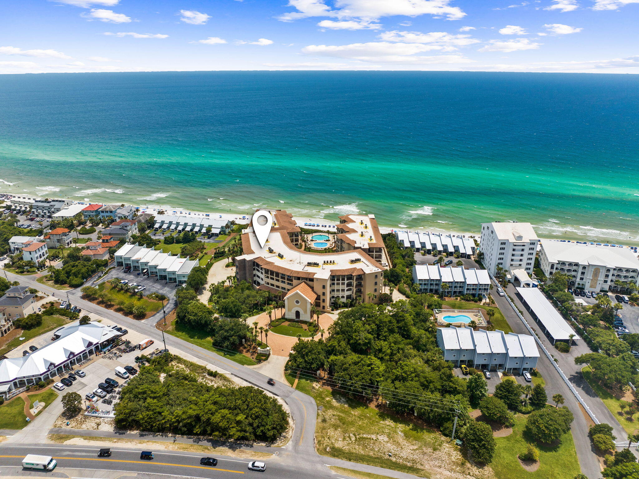 Indulge in refined coastal living at Bella Vita, a premier Gulf-front residence located along the iconic Scenic 30A. Perched atop one of the area's highest elevations, this exclusive gated community spans six acres and offers 365 feet of immaculate private beachfront.

Step onto your expansive private veranda to take in unobstructed Gulf views, or unwind by the beautifully landscaped courtyard featuring cascading fountains, lush gardens, and multiple pools—all perfectly positioned for stunning sunsets.

This beautifully updated condo features brand-new flooring throughout, fresh interior paint, and all-new windows and doors, blending modern style with timeless elegance. Residents enjoy an array of upscale amenities, including a gated entrance, brick-paved walkways, secure garage, abundant storage, and a state-of-the-art fitness center.

The Grand Hall invites gatherings and quiet moments alike, offering plush seating, a full kitchen, library, and outdoor patio. On-site maintenance and a dedicated HOA manager ensure a seamless living experience.

Bella Vita offers the perfect blend of luxury, privacy, and coastal charman exceptional opportunity to own in one of 30A's most sought-after communities.