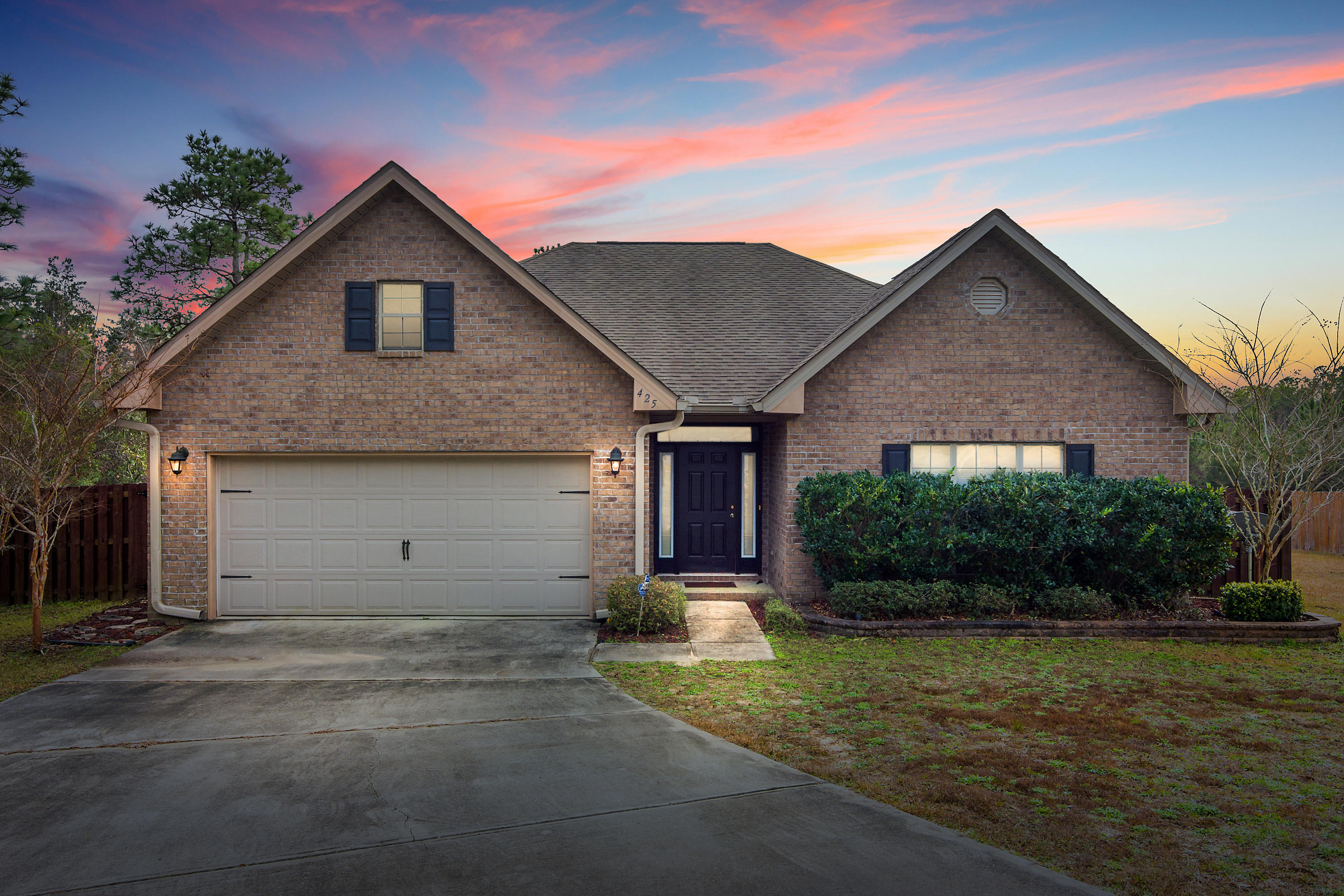 This exquisite 3-bedroom 2-bath home located in South Crestview is move-in ready. This home features all brick construction with vinyl soffits and sits on a large fenced lot. The split floor plan is complimented with low maintenance wood grain flooring. The spacious kitchen includes plenty of cabinet space, a breakfast bar as well as a quaint dining area. The oversized master suite includes a walk-in closet, double vanities, a large garden tub and separate shower. Enjoy spending time outdoors on the large back deck or enjoy an outdoor fire in your private back yard. This home is just a short commute to 7SFG, Duke Field, Eglin AFB and the beaches. Buyer to verify all measurements.