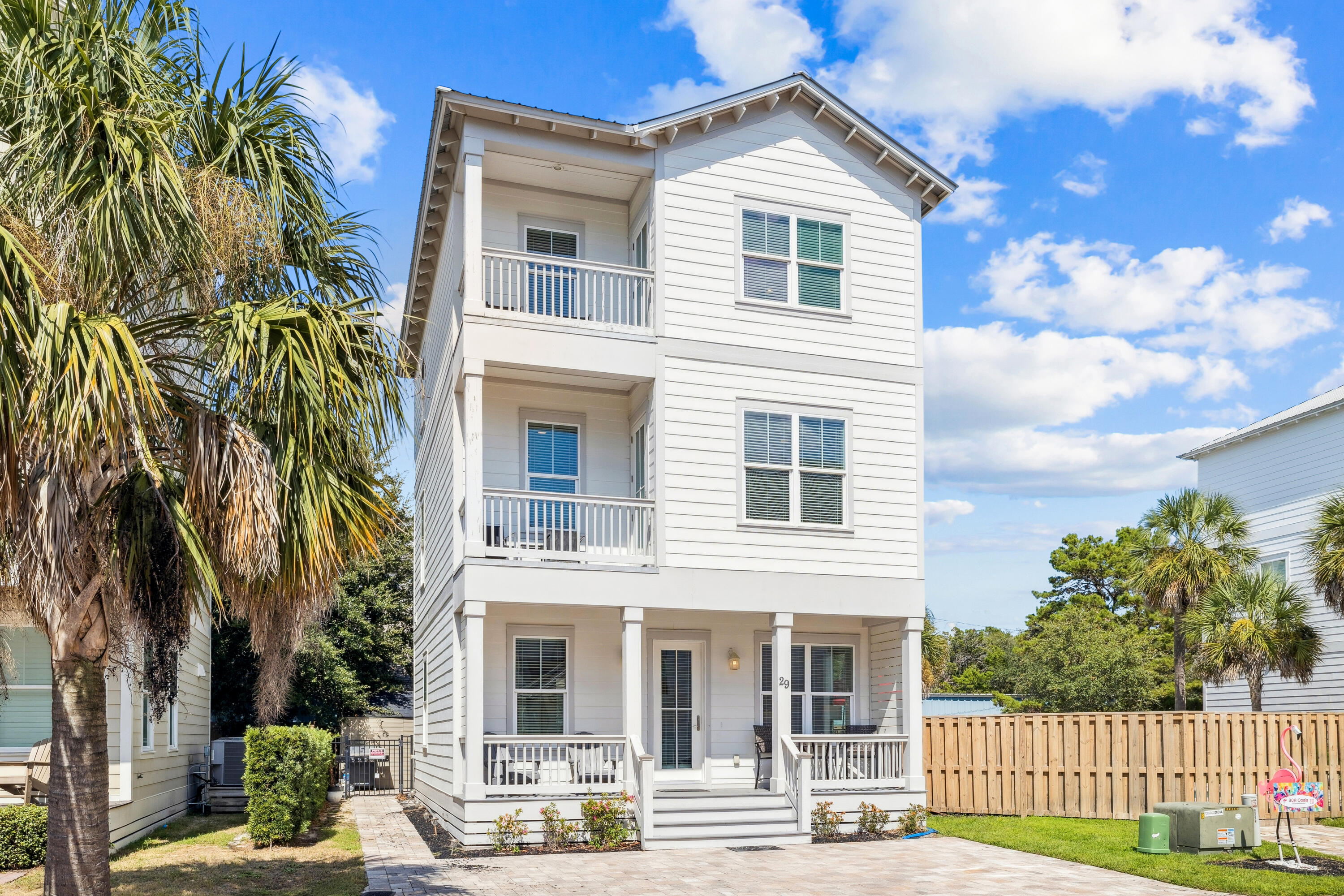 Nestled on the highly sought-after west end of 30A, this stunning coastal retreat offers the perfect blend of relaxation, style, and convenience. Just a short stroll to the sugar-white sands and emerald-green waters of the Gulf, this home provides the ideal setting for beachside living or an exceptional short-term rental investment.

The spacious open-concept main floor is thoughtfully designed for entertaining, featuring tile flooring throughout, granite countertops, and stainless-steel appliances. Four bedrooms and three-and-a-half baths offer plenty of room for family and guests, with private balconies off the second and third-floor front bedrooms showcasing gorgeous Gulf views.

Step outside to your private backyard oasis complete with a sparkling pool and spa, all managed by a Wi-Fi-enabled Hayward system that allows you to control the temperature and lighting right from your phone. The outdoor area also includes a drip-line irrigation system, a convenient storage shed for beach and pool essentials, and ample parking for three large vehicles plus one smaller car.

This home sits on an expansive double lot and is built with durability and peace of mind in mind  featuring hurricane-rated doors and windows, insulated floors for soundproofing, and a Rinnai tankless water heater.

Located just moments from iconic Gulf Place and beloved local favorites like Shunk Gulley Oyster Bar and Papa Surf Burgers, you'll enjoy music, dining, shopping, and entertainment just a short walk or bike ride away.

Turnkey and rental-ready, 29 Moonlit Shores Lane is an exceptional opportunity for those seeking a primary residence, vacation home, or high-performing investment property along 30A.