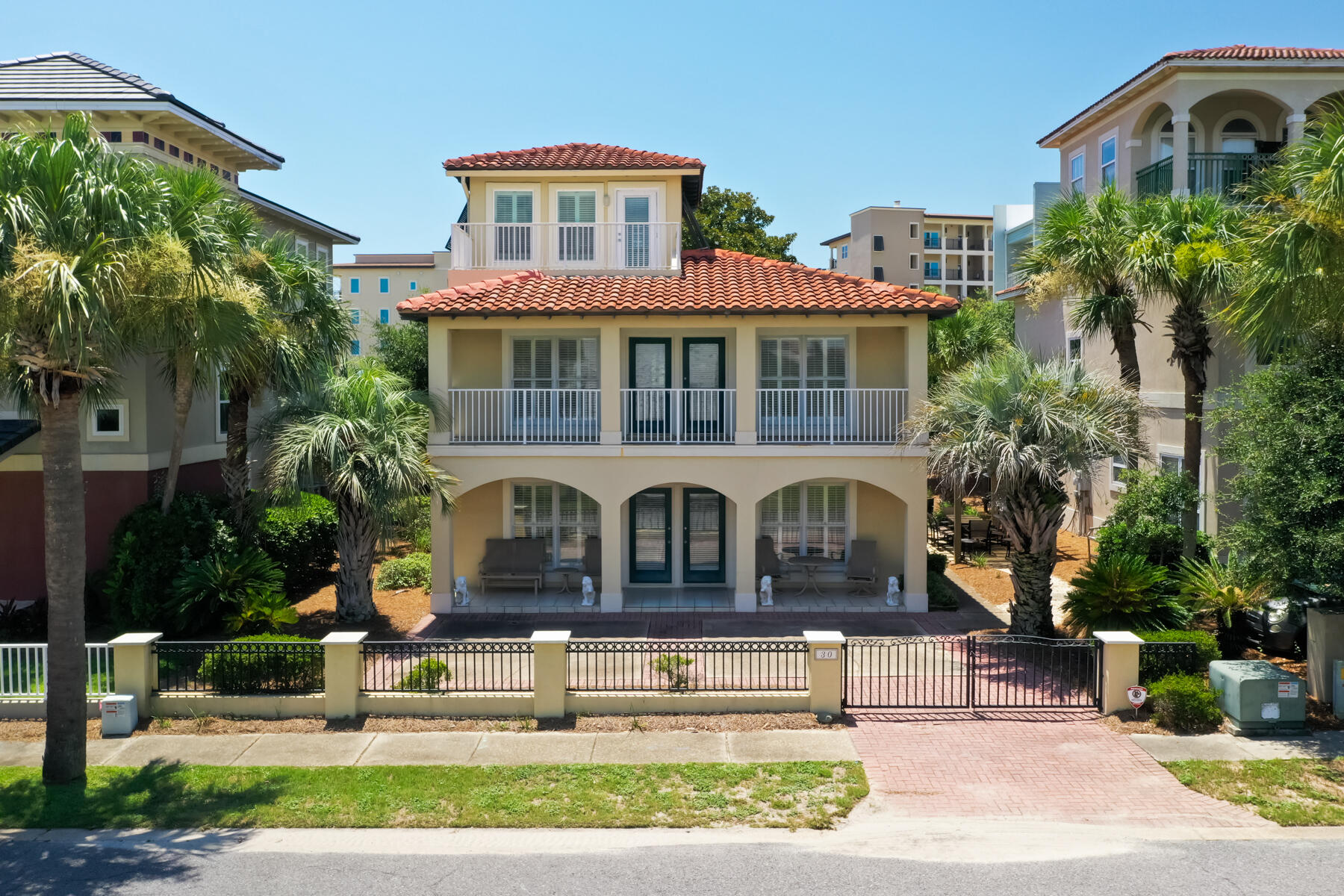 Incredible opportunity to own a private legacy home in highly sought after Grande Beach, South of 30A in Blue Mountain Beach.  Since 1996 this original owner has gently lived in this 3 bedroom 3 bathroom beach house a few steps from the private beach walkover that also has views of the Gulf from the 3rd floor balcony. No busy streets to cross to get to your own private beach.  There is so much to love about this house when you walk in and see the living room with an 18-foot vaulted ceiling and adjacent kitchen/dining area.  Though built in 1996 it has had very little use and maintained so well that it makes it feel much newer and not worn out and abused - it has never been a rental.  There is a large pantry just off the kitchen and huge storage area under the stairs. An outdoor shower helps you get the sand off when coming up from the beach and you can walk right into the bathroom from the outdoor shower area.  The neighbor to the North combined the area between the two houses to make a shared outdoor patio area - perfect for evening meals or family gatherings. The first floor has one bedroom, the second floor has the master bedroom and one additional bedroom.  The third floor has a pull-out day bed, office desk and wet bar area for drinks on the third-floor balcony.  This home is being sold AS IS and turn-key furnished. All measurements are estimates and should be verified by the buyers.