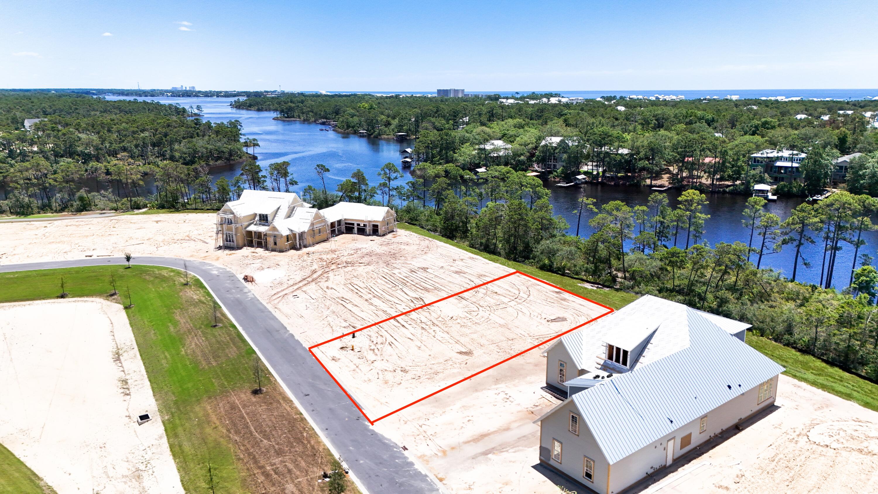 Build your custom dream home in Powell Landing West in the Watersound Origins community! Lot 78, which backs up to Lake Powell, the largest Dune Lake in North America, has expansive views of the Lake and is situated on S. Splash Dr, with no homes behind or directly in front. These custom homesites are ideally located in the Watersound Origins community with easy access to Lake Powell via a community dock. This particular lot has a buffer on the left, allowing for extra space around the home. With amenities such as a resort style pool, event lawns, nature trails, golf and the proximity to Watersound Town Center and the famed 30a corridor, the Watersound Origins community is the perfect choice for your new home construction.