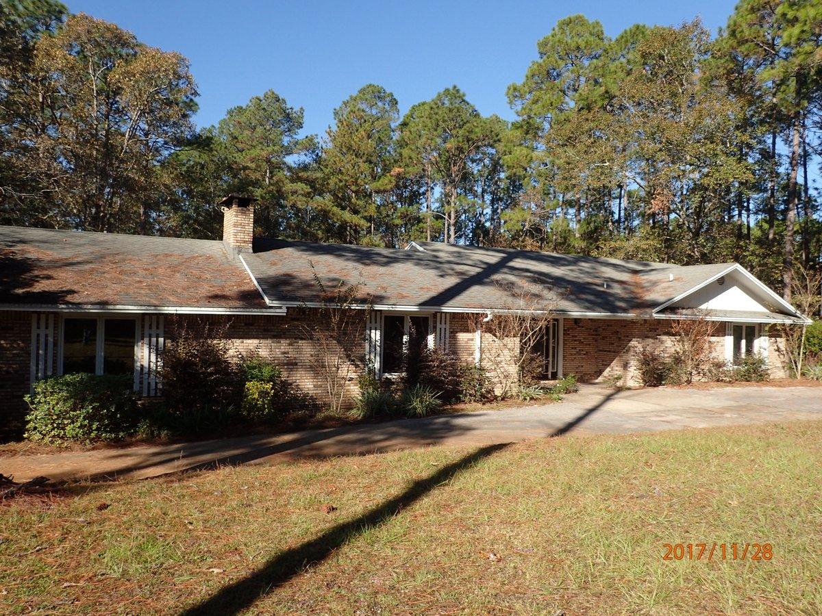 This REO property is being sold via Auction and an upcoming auction which is to be announced. Home rests on over 6 acres and has over 3000 square feet living space. Home has 3 bedrooms and 3.5 baths. Home is all brick and built in 1975. Partially fenced with in-ground pool. Please contact call for more information! Sellers asking price is $216,000.