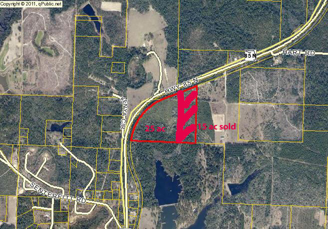 25 acres of Vacant Land with almost 2,000 ft of Highway 85 frontage. Most of the property is level land and has been timbered in the past. Electric is available along the highway; no other utilities on site but phone is available and septic systems would be sewage type.Future Land Use and Zoning believed to by Rural Residential but please verify as agricultural FLU and Zoning are within the original 40 acre parent property.