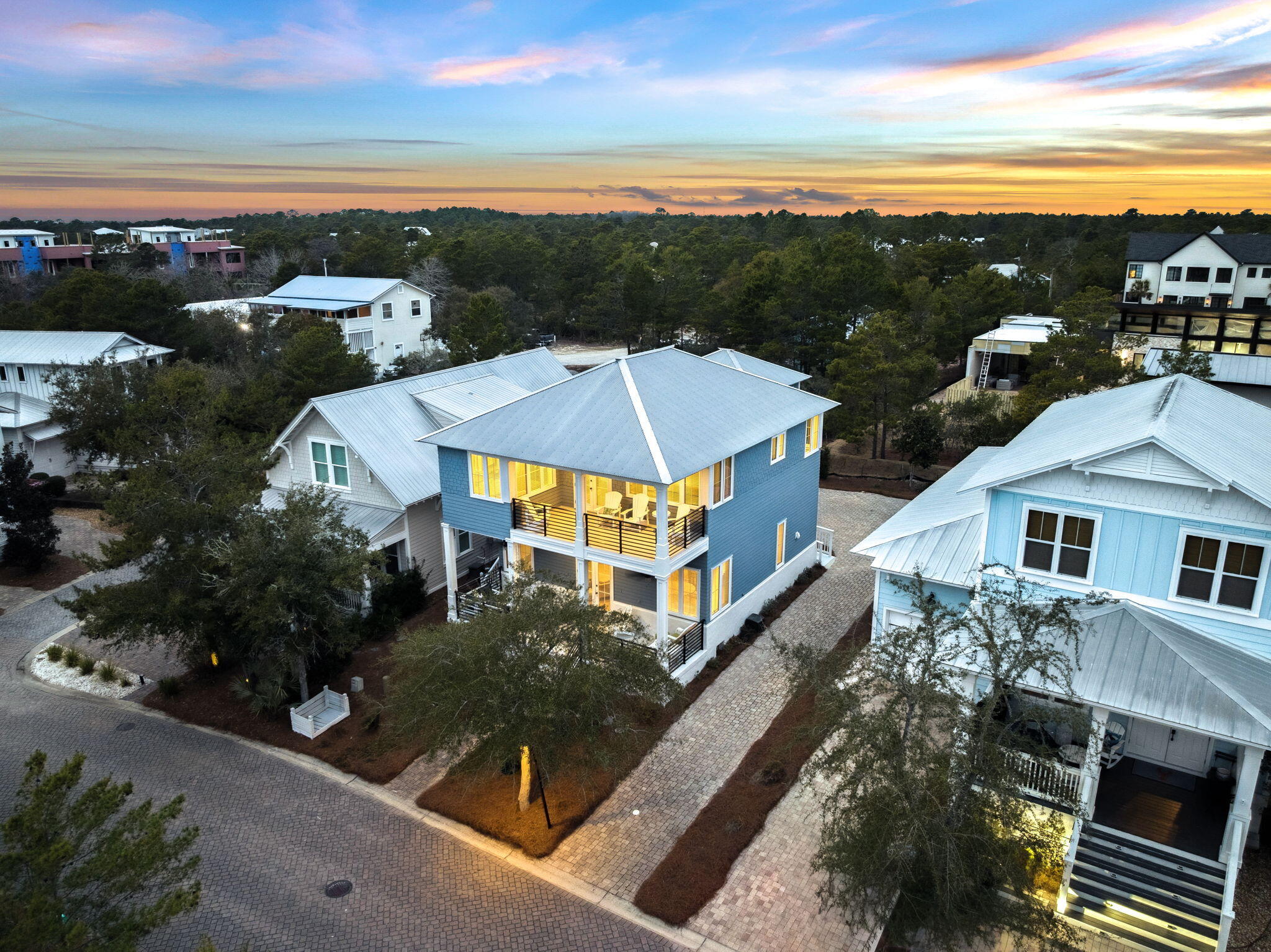 Step into a masterpiece of architectural design, where every detail exudes sophistication and luxury. This stunning residence boasts superior craftsmanship, featuring exquisite millwork, soaring 12-foot ceilings, and solid hardwood floors that create an ambiance of timeless elegance. The chef's kitchen is a dream come true, outfitted with a Viking gas stove, custom cabinetry, and distinctive lighting that perfectly blends style and function.  This home comes fully furnished and turnkey ready for full time residence, short term rentals, and/or the perfect second home.

As an added bonus, a charming carriage house—added in 2014—offers an additional bedroom, bathroom, and kitchenette, making it an ideal space for guests, a home office, or a private retreat. Nestled in the sought-after Highland Parks community, you'll enjoy access to unbeatable amenities, including a world-class heated pool, a beach-viewing tower to soak in breathtaking sunsets, and a pavilion designed for grilling and entertaining. This is more than a home it's a lifestyle waiting to be embraced.