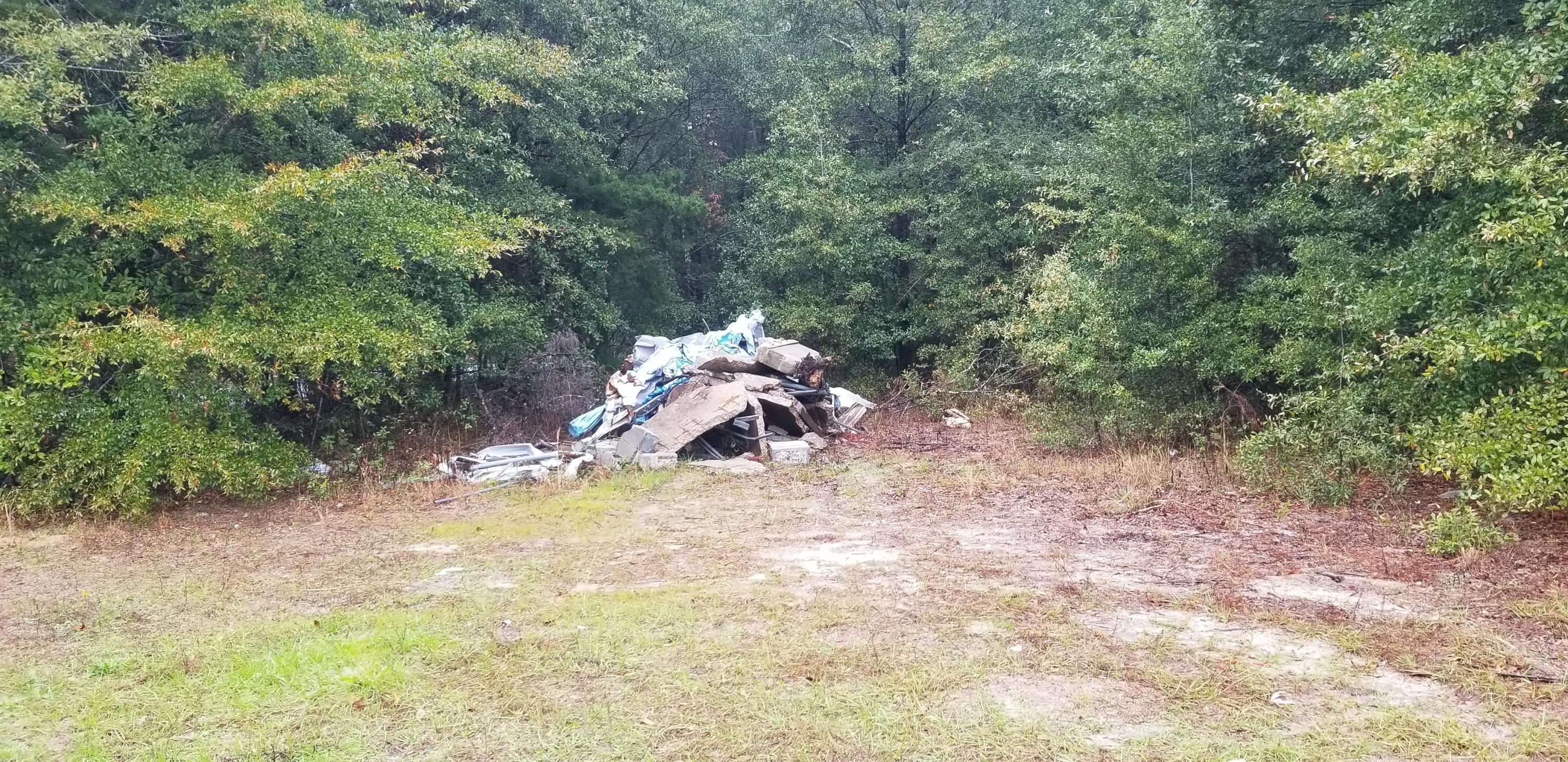 Wooded site on paved street. Property not listed, agent worked for buyer, put in MLS for sold comp.