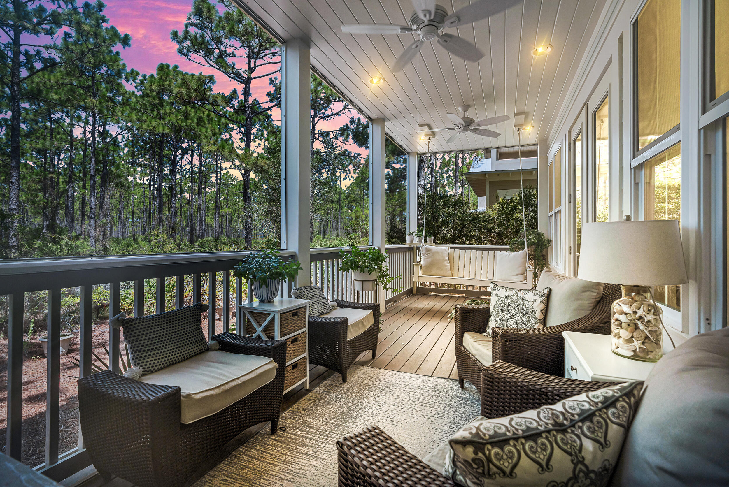 Best priced Cottage Collection home! Welcome to 9 Beargrass Way, a stunning coastal retreat nestled within the enchanting community of NatureWalk at Seagrove. This exceptional 4-bedroom, 3.5-bathroom haven is a true embodiment of serenity and comfort, offering an array of features that epitomize the perfect beachside lifestyle.

Step inside and be captivated by the warmth of solid pine floors that lead you through this thoughtfully designed home. As you explore, you'll discover four covered porches that beckon you to unwind and savor the coastal breeze. The back porch, a screened sanctuary, provides a picturesque vista overlooking the tranquil expanse of Point Washington Forest - a breathtaking backdrop that merges seamlessly with your living space. This fully furnished residence ensures that you can immediately immerse yourself in relaxation and leisure. Nestled on a quiet dead-end street at the forefront of the community, this abode offers an atmosphere of peaceful seclusion while remaining conveniently accessible.

Situated strategically, 9 Beargrass Way holds the coveted title of being the closest house to the pristine sands of the beach, allowing you to indulge in the sun-kissed shores with unparalleled ease. Positioned on a corner lot, the home is adorned with beautiful sunsets that filter through the surrounding trees, painting an ever-changing masterpiece of nature's splendor.

This remarkable property boasts a history of never being rented, ensuring that the integrity and care imbued by its owner remain intact. The generous parking area accommodates up to 3 cars effortlessly, providing convenience for both residents and guests.

Enhancing the appeal of this coastal gem, the Community Development District (CDD) bond has been paid off, translating to lower taxes and a more favorable financial arrangement. The house has recently received a fresh touch-up of paint and a thorough power wash, ensuring that it stands vibrant and inviting.

Naturewalk at Seagrove in Santa Rosa Beach, FL, is a sought-after community nestled along 30A, near Seaside and Watercolor. This charming haven seamlessly blends modern living with serene nature, offering quick access to the Gulf's crystal blue waters through its forest trail to the renowned 30A beaches. Tucked amidst the forest, the community provides tranquility while remaining connected to Hwy 395 for convenience. At the heart of Naturewalk lies The Gathering Place, an amenity center boasting pools, a hot tub, kiddie pool, firepit, grills, and more. Explore miles of trails, fitness stations, and access to Point Washington's trails, all encapsulating a harmonious blend of coastal lifestyle and forest retreat.

Don't miss your chance to own this exquisite retreat at 9 Beargrass Way, where every day offers an invitation to revel in the beauty of NatureWalk at Seagrove and create cherished memories amidst the coastal splendor. Your dream coastal lifestyle begins here.