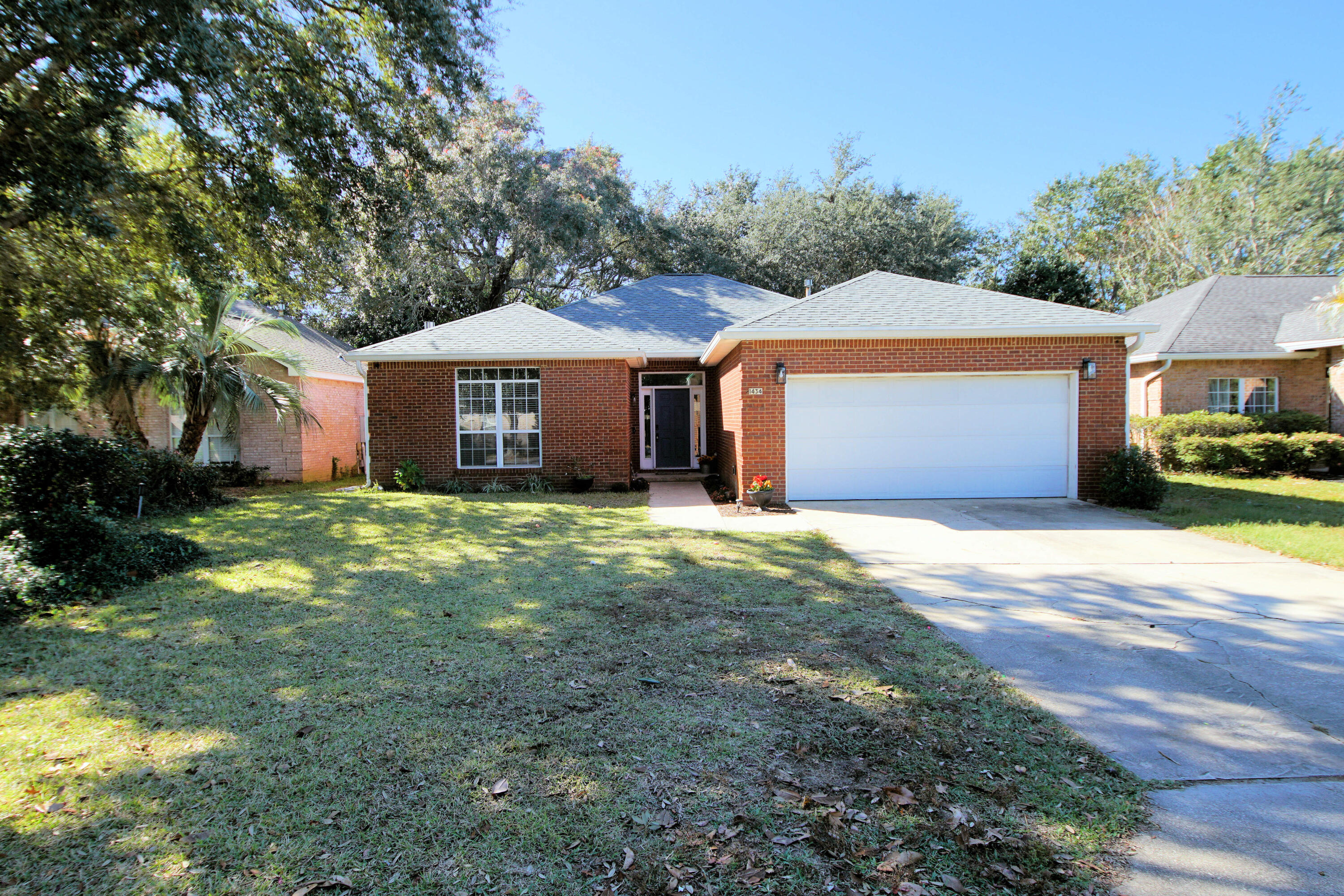 Welcome to The Crossings, located in the community of Bluewater Bay. This secluded neighborhood is just minutes from the amenities Bluewater offers. The home features three bedrooms, two baths, and a spacious flex room. The flex room provides many options: a home office, a playroom, or your personal workout space. The split floor plan offers extra privacy for the primary suite. The primary suite includes a large walk-in closet and an ensuite bath. The living room has a gas fireplace. The two additional bedrooms share a guest bathroom. There's a two-car garage and a fenced backyard. Neutral paint colors and vinyl plank flooring are throughout.