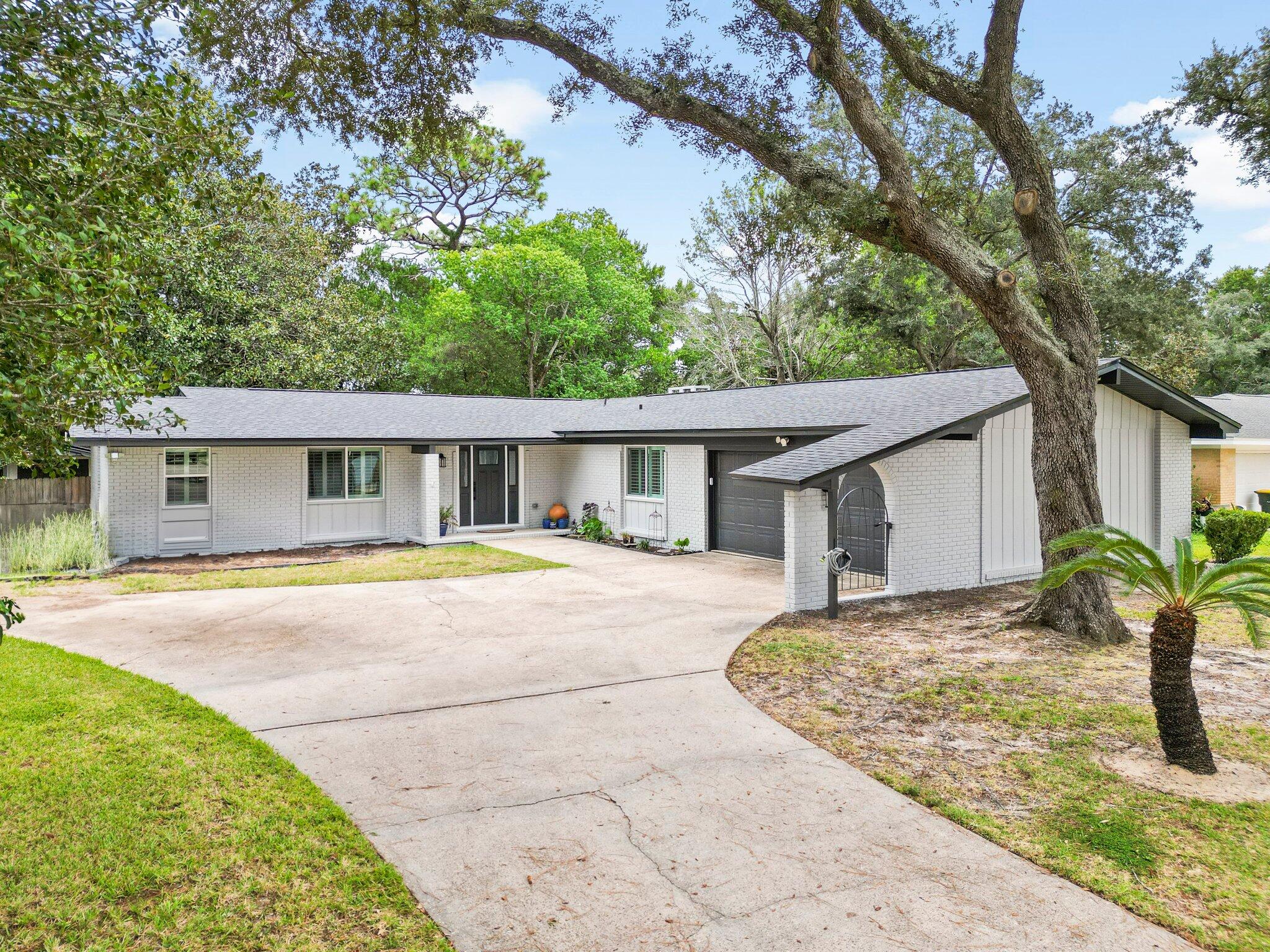 Welcome Home!  This 4/2 ranch style home in the highly sought after Kenwood neighborhood is full of upgrades!  From the gourmet kitchen to the newly painted brick exterior and new roof, no expense was spared in making this home remarkable.  As you enter the front door, you will notice the large living and dining room directly in front of you.  The master bedroom to the left is gorgeous with the custom walk-in closet and beautifully  renovated master bathroom featuring heated towel racks and a heated bathroom floor!  This home features engineered vinyl plank flooring throughout, stainless steel appliances in the gourmet kitchen, granite counter tops and an open floor plan for the kitchen and family room, making this home perfect for entertaining. The home was rewired in 2019, All HVAC ductwork replaced in 2019.  Plantation shutters new in 2021
Like new washer and dryer will convey.  
Schedule your showing today!