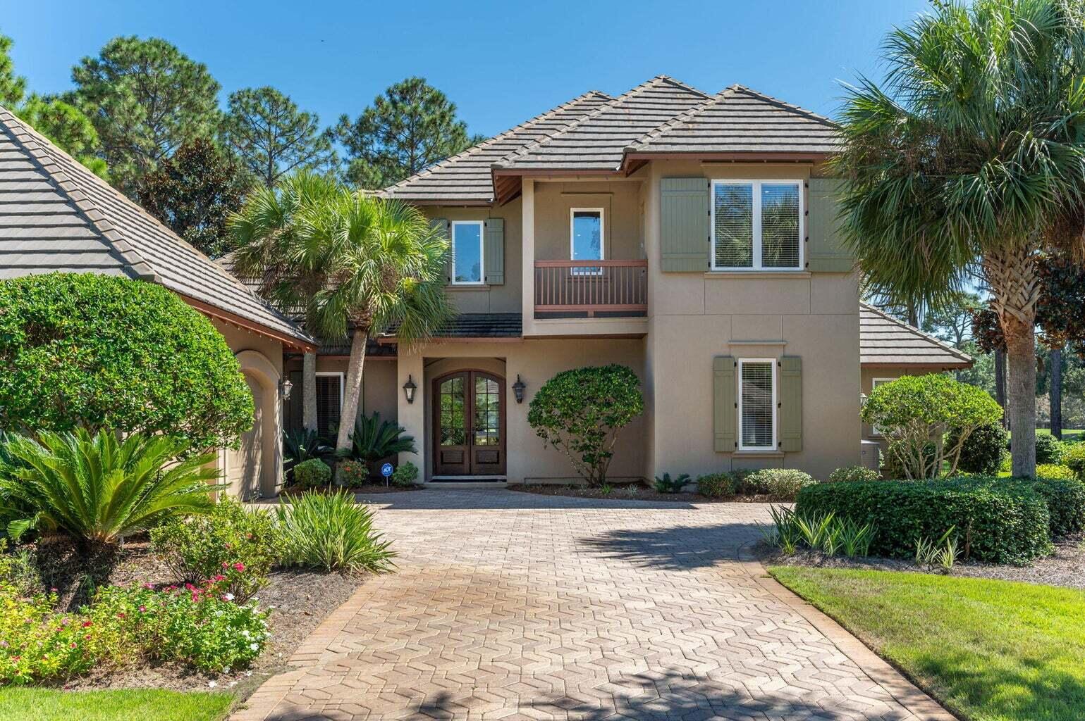 Don't miss out on the opportunity to experience luxurious living in this exceptional home located within the exclusive Island Green community, nestled within Sandestin Golf and Beach Resort. Situated with serene views overlooking the fairways of both hole 2 and 3 on The Raven Golf Course, this location offers tranquility while keeping you in close proximity to all of the fantastic amenities that Sandestin and the nearby Grand Boulevard have to offer. Upon entering this residence, you'll immediately appreciate its well-designed layout, perfectly suited for both leisure and entertainment. The family room boasts a charming fireplace, providing a cozy retreat after days spent at the beach, boating, or on one of the four golf courses within Sandestin. The indoor and outdoor spaces blend seamlessly as you step into the screened outdoor living area, a private oasis complete with a pool, hot tub, and a charming water feature. Ideal for year-round outdoor entertaining, the fully-equipped outdoor kitchen features a grill, fireplace, television, and ceiling fan, making it perfect for all seasons. The rear walls of the family room open entirely into the outdoor living area, transforming into one expansive space perfect for summer pool parties or fall evenings enjoying dinner on the terrace. At the heart of the home is the chef's kitchen, equipped with ample cabinetry, high-end stainless-steel appliances, an oversized gas range, a large island, and beautiful granite countertopsan ideal space for culinary enthusiasts. The formal dining room, positioned between the inviting sitting room and the spacious family room, sets the stage for delightful gatherings and family dinners. The first-floor primary bedroom offers a peaceful escape, with an attached private office and access to the outdoor living area. The ensuite boasts a spa-like travertine tile shower, soaking tub, his-and-hers vanities, and a generously sized walk-in closet. Across from the master suite is a flex space - perfect for whatever you need it to be! An exercise room, playroom, hobby room, or additional office space, this versatile location can easily be outfitted to suit your needs. This adaptable room also provides interior access to the designated golf-cart garage. Completing the first floor, you'll find a spacious laundry room with built-in cabinetry and a sink, an attractive half bath, an oversized two-car garage with shelving, a welcoming foyer with an entry closet, and pantry storage off the kitchen. Upstairs, an additional family room serves as an excellent spot for cozy movie nights or a dedicated space for kids' entertainment. This room features a convenient wet bar and access to a spacious balcony with stunning views of the Raven Golf Course. The spectacular view makes this one of the best spots in the home, perfect for starting the day with a cup of coffee or unwinding with a glass of wine in the evenings. Two sizable bedrooms, each with a private balcony and walk-in closets, are located on the second floor. One of these bedrooms features an ensuite bathroom and a balcony overlooking the golf course, while the other offers a balcony with views of Island Green Drive and a flexible bathroom that can be configured as an ensuite or for guest use, depending on your needs. Additional storage can be found in the walk-in attic space. This meticulously maintained home had all three HVAC units replaced in early 2023. With its close proximity to world class amenities, fine dining, upscale shopping, and an abundance of entertainment options, you'll enjoy the best that the area has to offer. This home is just a short golf cart ride away from the private beach club on our white sand beaches, 4 championship golf courses, a world class tennis center, a 113-slip deep water marina, Jolee Island, the Phil Hummel swimming pool, plus all that the Village of Baytowne Wharf and the Grand Boulevard at Sandestin has to offer. Experience the epitome of luxury living in this exceptional home at 1517 Island Green Drive.
