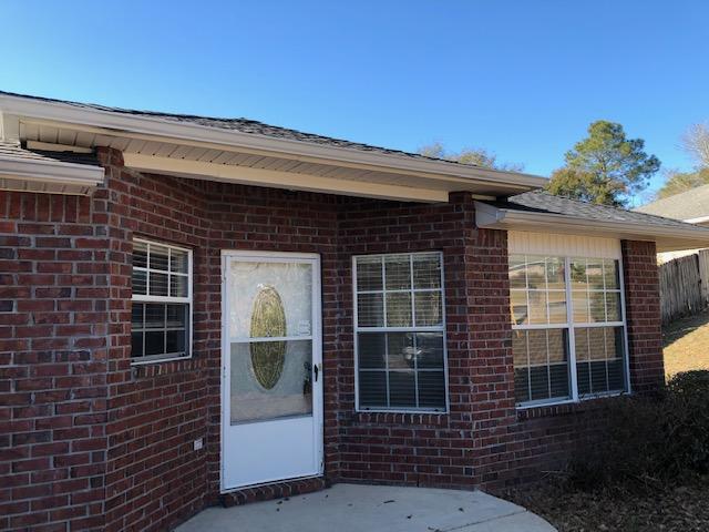 The convenient southside location of this spacious three bedroom, two bath home close to Eglin and the beaches of the Gulf of Mexico is just one of the many attributes for buyers to consider when viewing this property. Outstanding features include large rooms throughout, formal dining room with crown molding and chair rail molding, wood burning fireplace in the great room, and a large kitchen/dining combination with lots of  cabinets, pantry and an island bar with outlets. The 17x14 master bedroom has a large master bath with double walk-in his and her closets, double vanity and garden tub. The large fully fenced backyard has lots of possibilities. New roof was installed in early January 2021.