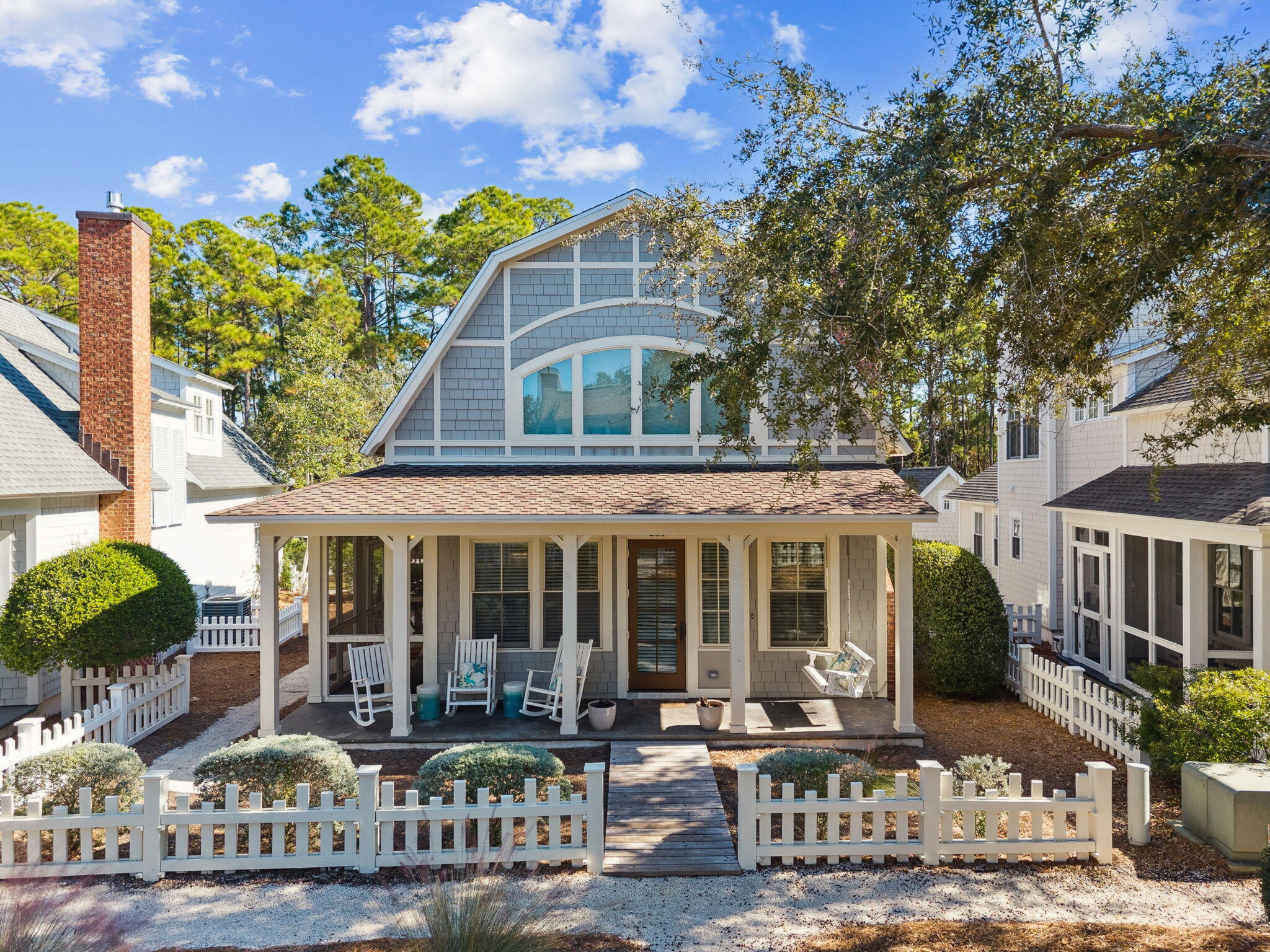 Welcome to 'You Are My Sunshine,' a charming beach cottage in the heart of WaterSound Beach.
Freshly updated with new floors, paint, and furnishings, this turnkey retreat is bright, inviting, and move-in ready. It comes fully furnished, rental-ready, and includes a golf cart—perfect for enjoying everything the neighborhood has to offer.
The open living and dining area flows into a well-equipped kitchen with stainless steel appliances and generous storage. Two ensuite bedrooms are conveniently located on the main level. Upstairs, the spacious suite features a queen bed, bunk bed, a walk-in shower, and a clawfoot tub.  A paved driveway provides parking for several cars, and plans for a garage are available for added value. Outdoor living includes multiple porches and a private deckperfect for relaxing after a day in the sun.
Located in an upscale gulf-front community, this home offers access to resort-style amenities just a golf cart ride away, including pools, parks, boardwalks, a fitness center, and a putting green. The sugar-white beach is only three blocks from your doorstep, with world-class dining, shopping, and entertainment all close by.