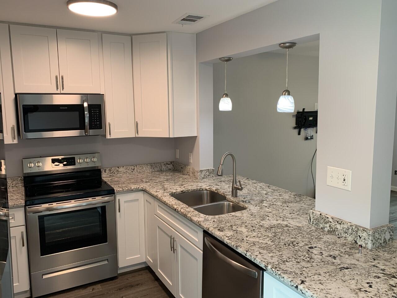 Beautifully remodeled townhome located in central Destin. Featured upgrades in 2021 include...Privacy Fence, LVP Flooring Throughout, Kitchen Cabinets, Granite Counter Tops, Refrigerator (Samsung), Cooktop Stove (Frigidaire), Microwave (Frigidaire), Washer & Dryer (Amana), 50 Gallon Water Heater. New exterior electrical panel, windows and doors in 2022.