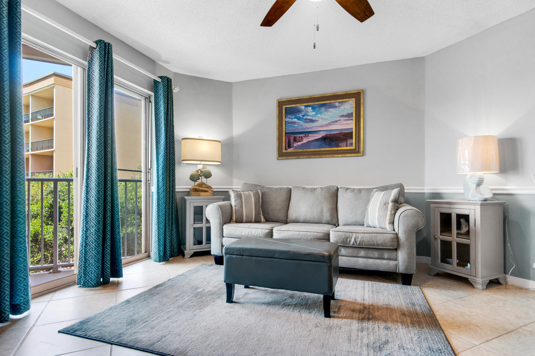 This condo in Gulfview II, conveniently located in the heart of Miramar Beach, opens up a world of vacations or rental income potential. With deeded beach access directly across Scenic Gulf Drive to over 100 feet of beautiful beach, two community pools, hot tub and a grill area, owners and guests can enjoy the quintessential Florida lifestyle. Located in a low-density building, this one bedroom condo has been updated to include tile flooring throughout as well as a stylish kitchen that features modern raised panel cabinets and stainless steel appliances. The condo also features built-in bunk beds in the hallway. The living area features a large sliding glass door which allows for ample natural light and opens to the private balcony - The perfect place to relax after a day at the beach.