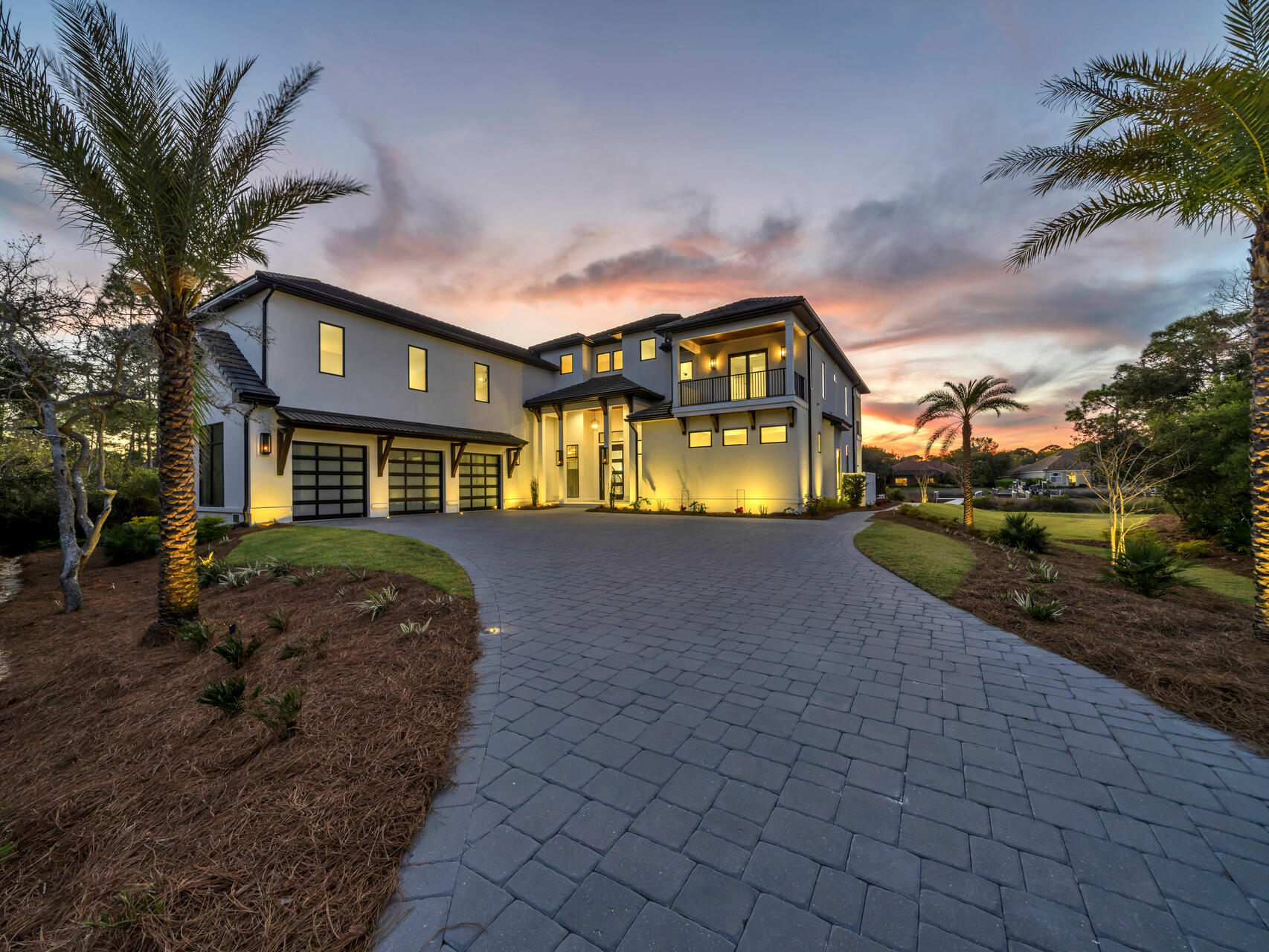 Introducing a 2024 built 6BR/6.5BA Coastal Modern waterfront estate in the gated community of Kelly Plantation. Appraised at 4.9M(appraisal attached), this property is priced to sell! 

Designed with over 6,651 sq ft of heated/cooled space (8,917 sq ft total), this property offers 520 feet of deep-water frontage on Jones Bayou, a private heated saltwater pool and spa, and a 120' x 32' private boat dock with Tru-Flow composite decking.

A 14' LED-lit paver driveway leads to the custom pivot front door and an expansive great room with a 26' lighted tray ceiling, Venetian-plaster gas fireplace, and large picture windows overlooking the water.  The chef's kitchen features a Wolf gas range, Sub-Zero refrigerator/freezer, quartzite waterfall island, and a full butler's pantry with ice maker, beverage fridge, microwave, and sink. A glass-front wine room connects the kitchen and dining space, which opens directly to the outdoor kitchen and pool deck.

The first-floor primary suite includes a fireplace, glass accordion doors to the lanai, and a spa-style bathroom with floating vanities, freestanding soaking tub, and a large walk-through shower with dual heads and rain fixtures. Two walk-in closets, an office with hidden safe room, powder room, laundry room, and mud room complete the first floor.

Upstairs offers four additional ensuite bedrooms (including a secondary suite), a flex room with sauna area, theater/media room with raised platform seating, a wet bar, family room, second laundry room, and two private balconies. A custom metal-and-wood catwalk provides views of the great room and waterfront.

Outdoor features include a heated saltwater pool with LED lighting, spa, outdoor shower, ceiling-mounted speakers, natural-gas grill, beverage fridge, and ice maker. The 3-car garage offers glass-pane doors, custom cabinets, sink, and a charging outlet. Home systems include four HVAC units, two tankless gas water heaters, LED landscape lighting, irrigation system, and WiFi-controlled pool/spa equipment.

The property is located in Flood Zone X with an approved FEMA LOMR. Kelly Plantation amenities include an 18-hole golf course, owner's club, fitness and yoga facilities, tennis, pickleball, dog park, nature trails, and more. Nearby are beaches, marinas, restaurants, shopping, and entertainment.

This property combines new construction, deep-water access, and extensive indoor/outdoor living areas within one of Destin's premier gated communities.