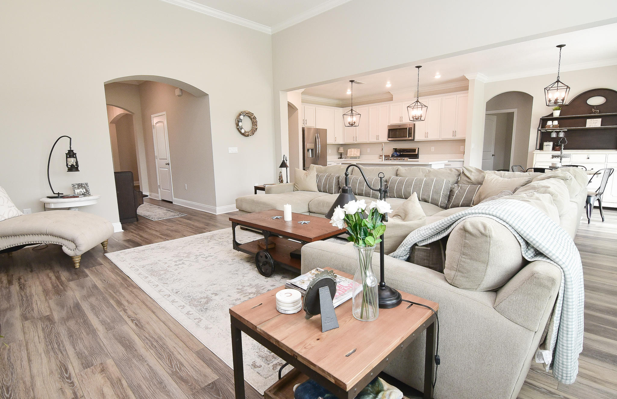 This beautiful Lilac model has been made better than new! This home, on an over sized premium lot, was finished in October of 2019 with many builder upgrades costing over $23,000. The owners have gone even further, including adding custom lighting and beautiful sliding barn doors from the kitchen nook to the expansive patio at the rear of the home. The design, materials and finishes are the latest in interior design and style, from the LVT flooring to the Alpine White cabinetry and Agreeable Grey interior paint scheme. The upgraded kitchen appliances feature a Maytag gas range, dishwasher and microwave, and all are clad in stainless steel. The classic stainless look continues in the kitchen with an upgraded high arc faucet, range hood and satin nickel finish pulls and handles . Plenty of All countertops throughout the home are a beautiful quartz. The Shaw LVT flooring upgrade was applied in the foyer, living room, dining room, great room, guest hall, kitchen, breakfast area all three bathrooms and the convenient laundry room. 
An electrical receptacle has been added in the floor of the spacious great room, so you have power where you need it.
Backyard living space features a concrete and brick patio that is nearly the width of the home. The premium over sized lot has plenty of room for a pool, storage or an outdoor kitchen. 
Flood lights have been added to the rear of the home for extra security. 
When you add all the amenities and beauty of Hammock Bay to the home and it's features, this is a terrific opportunity!