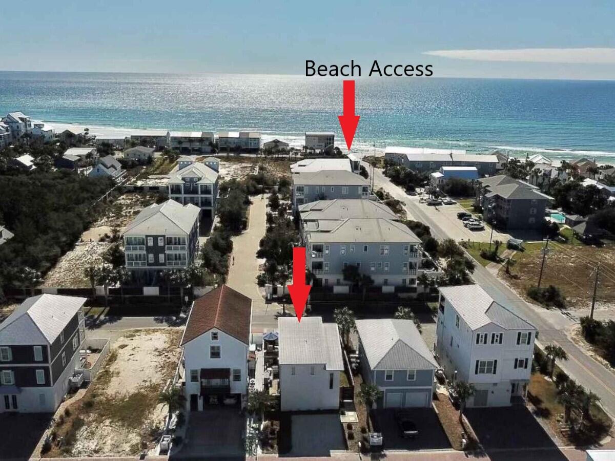 Welcome to your perfect beach getaway, only 300 yards from the Gulf of Mexico! This modern beach house offers the ultimate in comfort, luxury, and convenience. Step inside and you'll be greeted by an open and spacious living area that's perfect for relaxing and entertaining. The living room features comfortable seating, a large flat-screen TV, and plenty of natural light, while the dining area and fully equipped kitchen make it easy to cook and dine in style. The kitchen features KitchenAid gas appliances, including a stove, oven, and range hood, as well as a wine refrigerator, perfect for storing your favorite bottles. The master bedroom is located on the main level and offers a comfortable king-size bed and a spacious ensuite bathroom with double vanity. Upstairs, you'll find a guest bedroom with a queen-size bed, as well as a hallway with built-in bunk beds, perfect for kids or extra guests. But perhaps the best feature of this beach house is the amazing outdoor hangout space. Step outside and you'll find a spacious patio area complete with comfortable lounge seating, a gas BBQ grill, and a private saltwater pool. Whether you're soaking up the sun, taking a dip in the pool, or enjoying a meal al fresco, this outdoor space is sure to be your favorite spot in the house. And with the beach just a short walk away, you'll have easy access to all the sun, sand, and surf you could ever want. Sold fully furnished with NO HOA Fees and rental projections up to $80K annually, you won't want to miss this chance to own along 30A.
