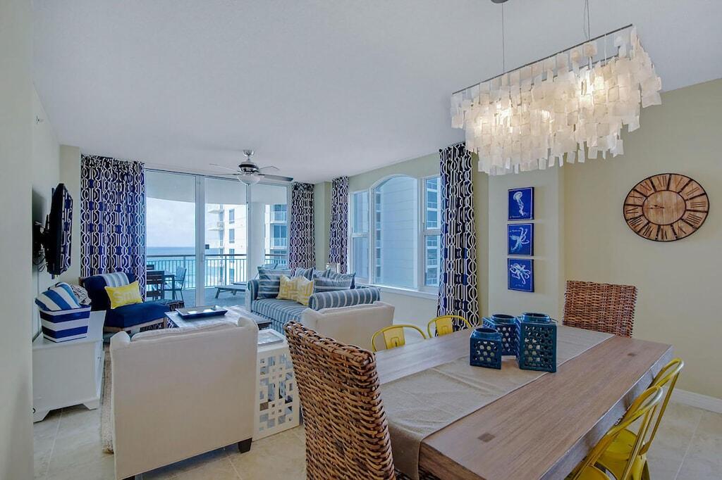 This is a gorgeous 1770 square-foot luxury condominium located directly on the sugar-white sands and emerald green waters of the Gulf of Mexico. Located on the 6th floor in the beautiful Beach Colony West, it boasts professional decor and plenty of space to accommodate your family and friends. The open floor plan includes a spacious kitchen, granite countertops, breakfast nook that seats at least 6 with amazing views of the entire peninsula. There is a large dining room table and plenty of seating in the living room. The 360 sq/ft terrace offers unobstructed views, which include the longest pier in Northwest Florida.
The master suite features access to the terrace, views of the gulf, and a jetted whirlpool tub overlooking the Emerald Green Gulf waters. Beautifully decorated in whites corals, and sea blue colors with a large walk-in closet, you'll feel like you're a guest at the finest 5-star resort and never want to leave your king-sized bed.
The second bedroom also features a king-sized bed with more beautiful views of the Navarre Sound and a full-sized ensuite bath. This room has beautifully appointed custom-made bedding and drapery in ocean blues and yellows.

The third guest suite features a full-sized ensuite bath, full bunk beds with a full trundle, accommodating up to 6. Custom bedding and drapery provide a coastal feel retreat featuring bright blue and green bedding.
A laundry room with a full-sized washer and dryer provides easy clean-up after a day at the beach or lounging by the largest pool in Navarre!

Navarre Beach is centrally located, between Pensacola and Destin, with restaurants, shops, outlet malls, and plenty of kid-friendly activities and entertainment available for your enjoyment. In addition, there are three excellent restaurants and bars are within walking distance!

The condo also has two parking spaces, one reserved, one unreserved, in the same building as the onsite tennis courts. There is also a small fitness center available for those who want a little more than long walks on the beach or through the nearby National Beach reserves.