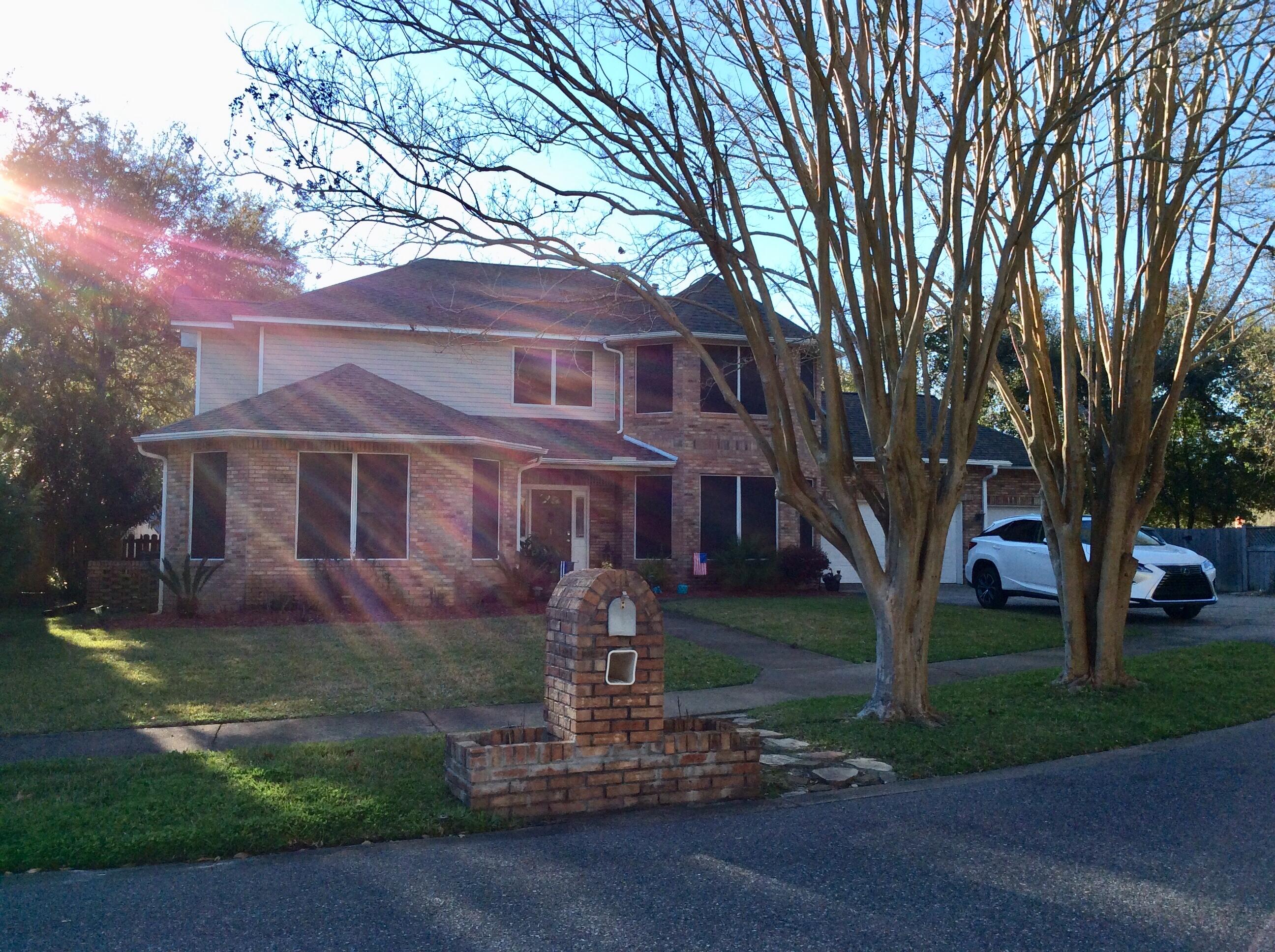 UPGRADED AND  UPDATES and room for a pool. The waterfront community of Islandview Bch has a community pool and access to the waterfront of Santa Rosa Sound. Walk down the road with your bathing suit and fishing rod.  Boat slips may be available for a rental fee.  This is a gorgeous super brick house ideally located within an easy commute to schools, shopping the military bases of Eglin and Hurlburt Field, restaurants and the beaches of the Gulf Of Mexico.  You will be charmed by the double staircase, high ceilings and space throughout.  Take the right stairs to find a bedroom, an attic room for a sitting area plus an additional space beyond for office/craft/storage.  Must see to appreciate all the beautiful features of this house.
There is current litigation against the HOA by one of  the owners in the sub-division. Buyer to verify all measurements and pertinent information.