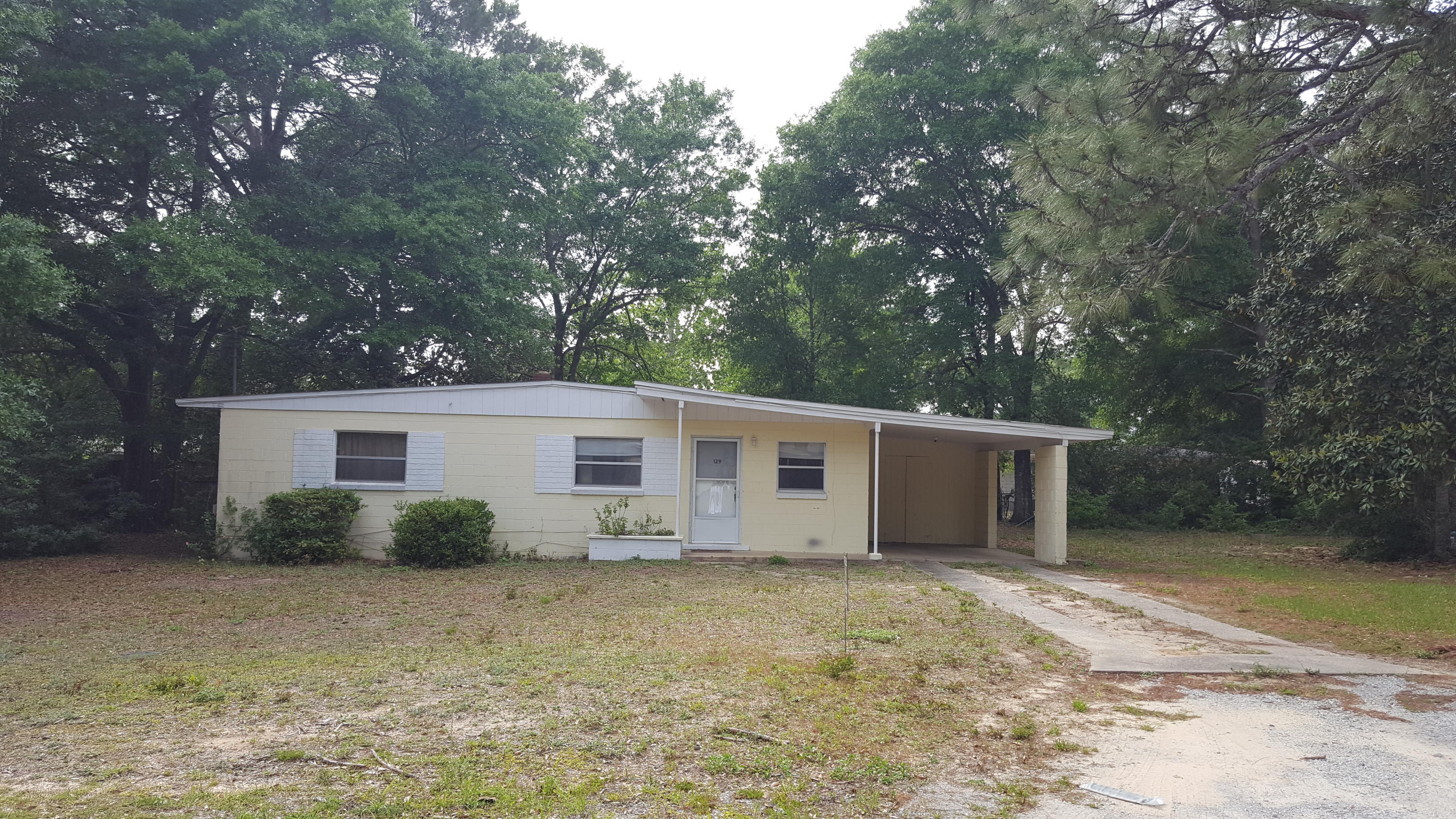 AVAILABLE for move in May 6!! Great home, great price! Three bedroom, 1 bath with large yard. There are two living areas, one as you first enter the home, and a great room in the back of the house. The great room is HUGE (23.5'x16'!) and is perfect for family fun and entertainment. From the kitchen there is a ''bar'' looking into the great room - a perfect way to keep the cook in tune to what going on. If privacy and space are a concern, the hallway leading to the bedrooms closes off and has 3 closets total - one coat closet and 2 large additional closets. The bedrooms each have ample closet space, as well. This house is in an ideal location, central to schools, bases, and shopping. No inside smoking. Owner may approve 1 small dog under 10 lbs, no cats.