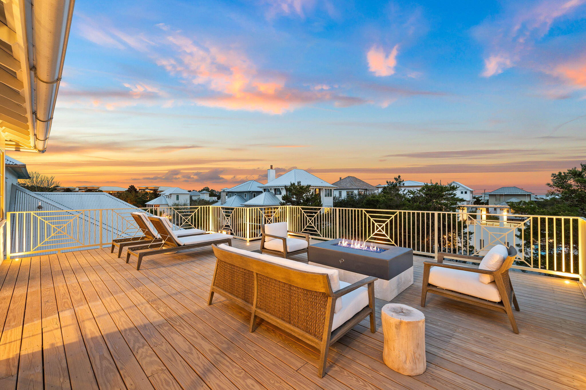 Positioned within the private gated enclave of Seanest Village, this newly constructed Greg Jazayeri design executed by the renowned team at Focus Construction seamlessly blends organic aesthetics with breathtaking views of the Gulf and surrounding topography. Upon initial approach, the gas lantern lit courtyard opens up to the entry foyer featuring venetian plaster surfaces and stunning European hardwoods that are carried throughout the residence. A pair of junior suites equipped with private-ensuites boasting floating vanities and custom built-in closets along with a two-car garage complete the first level.
 
Doubling as a statement of craftsmanship, the wood adorned staircase with metal accents leads way to the living and dining areas configured with entertaining in mind. Akin to the woodland abutting in the rear, the pecky cypress accents and wood mediums found throughout the living area further the connection with the preserve- a coveted characteristic seldomly found along 30A while remaining less than 1,000' from the famed sugar white sand and turquoise hued waters. Ideal for culinary enthusiasts, the gourmet kitchen encompasses custom cabinetry, stunning quartzite countertops, an extended kitchen island with integrated seating, and a luxury appliance suite. The covered patio provides additional dining and lounging space in addition to an outdoor kitchen effectively blurring the lines between indoors and out. A guest suite with private balcony and laundry quarters are also found on the second floor. 
 
Anchored by a wall of windows showcasing views overlooking the tree line, the bright and airy main suite situated on the third level is synonymous with relaxation with smooth venetian finished walls, soaring vaulted ceilings, and a dedicated covered terrace. The attached sumptuous ensuite creates a spa-like experience with a freestanding soaking tub, marble tiled walk-in shower with seating, and a separate water closet. 
 
Perched atop the roofline, the viewing deck with firepit and sunning area provides the perfect place to admire the picturesque Gulf-views and everchanging palate of mesmerizing hues emitted by the renowned Emerald Coast sunsets each and every night. Preparing a morning beverage or evening night cap is made possible by the fully equipped wet bar on the third-floor servicing both the main suite and viewing deck. 
 
67 Sand Oaks is professionally curated by the talented interior design team at Oak & Anchor. The convenient proximity to three local beach access points coupled with impressive rental income potential make this a compelling opportunity for investors and full-time residents alike. The sought-after community of Seanest Village in Seagrove Beach on 30A provides residents with heightened privacy and an array of amenities while remaining geographically poised near all of the acclaimed dining and entertainment venues 30A has to offer including the newly opened Greenway Station town center. Inquire today to arrange a viewing and start envisioning the coastal lifestyle you deserve.