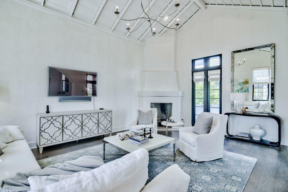 This recently updated courtyard home in Alys Beach is centrally located within the community with close proximity to Caliza, Zuma Fitness Center, and the future Beach Club. The home features a first floor guest master suite separated from the main house by a beautiful courtyard fountain and outdoor loggia. The first floor of the main house features a master suite, which overlooks the beautiful courtyard and fountain, as well as a generously sized guest suite. With a dramatic staircase leading the way, the second floor gives way to a large guest suite and beautiful entertaining area, featuring a large open concept kitchen, dining, living area, complete with a secondary living room, as well. The second floor is also home to an outdoor entertaining area, which overlooks the courtyard and rooftops of Alys Beach.