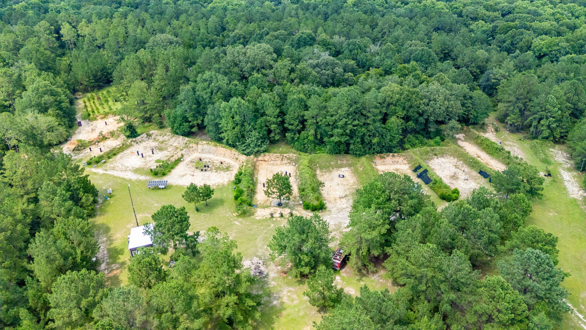 40 Acres - Off-Grid Outdoor Paradise with Tactical Shooting Range & More! Rare off-grid retreat with deeded access off Co. Hwy 181. Property is high and dry with multiple tactical shooting ranges, 600 sq ft enclosed pole barn, a solar-powered setup, including a well with dual batteries, and a brand-new 5k backup generator. Stay comfortable with a mini-split A/C system and connected via WildStar internet. Outdoor bathroom included. Loaded with wildlife—deer, turkey, and more—this is a true outdoorsman's paradise. Whether you're looking for a hunting camp, training ground, or peaceful escape, this property offers endless potential. This is one you won't want to miss!