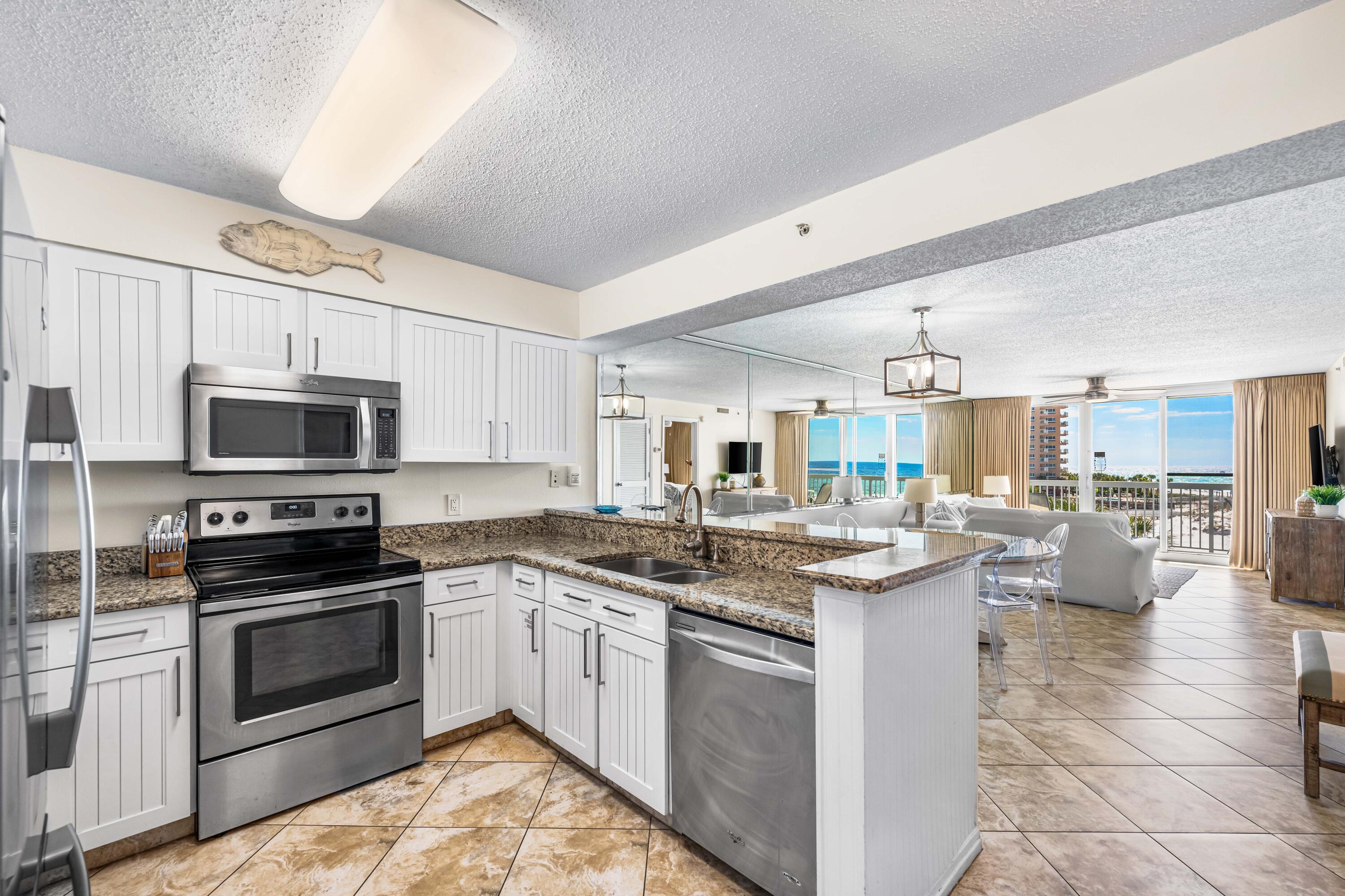 Incredible deal on the best priced 2 BD GULF FRONT unit in Pelican Beach! Over 10% ROI. $86K in gross rental history with Spring and Summer bookings to transfer. 

Overlooking the Gulf, in the heart of Destin, this unit proves to be an exceptional rental investment with high income, 2025 bookings to transfer and 150+ reviews. Renovated with updated stainless steel appliances, granite counters, new cabinets, lighting and furniture, this 2 bedroom boasts gulf views overlooking the lagoon pool with a full balcony. Known for the amenities, enjoy 3 pools including a gulf front pool with expansive hot tub, beach service, huge sunning deck, exercise room, steam room, sauna, convenience store, deli and a beachside bar. Attractions like Big Kahuna and putt-putt nearby.