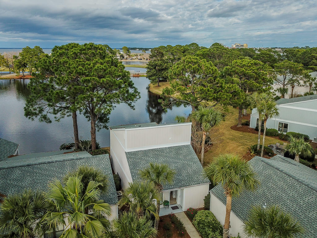 Bay view home on a Sandestin lake completely remodeled and ready to go! Seller has updated this home from top to bottom! New tile walk-in shower in master bedroom suite, all new bathroom fixtures, fresh paint, updated kitchen with tiled backsplash, new stove, fridge, lighting and glass in some windows/slider.
Master bedroom has a private balcony with a Choctawatchee Bay view, as well as a view of the lake. There is a large patio on the main level too, with plenty of room to entertain and show off those water views. 741 Sandpiper is a free-standing condo, unattached. There is lots of parking in the shared driveway, plenty of room to fit in a couple cars, and a golf cart!