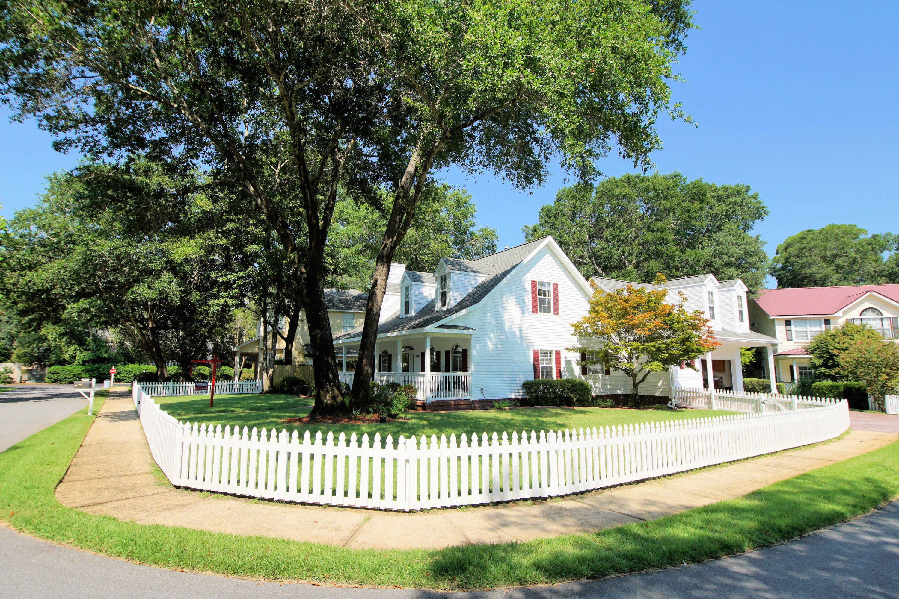 Updated Sweet Home Builders 3 or 4 bedroom home in desirable Village of Bolton in Bluewater Bay. Gracious living reminiscent of a bygone era: white picket fences, sidewalks and wide front porches invite neighbors to ''come sit a spell'' and provide the perfect spot for morning coffee or afternoon refreshments. Immaculately maintained and located on a quiet cul de sac, this home is ready for new owners. The master suite is on the first level and features a ''bubble tub'', double vanity, his and hers walk in closets, updated granite counters and tub surround, porcelain tile shower with dual shower heads, and...Heated floors! The kitchen has also been updated with stainless appliances, granite counters and wood cabinets, with under counter lighting. The dual fuel stove will be the chef's delight. Other features that discriminating buyers will appreciate include crown molding (some double crown), window pediments, can lights, skylights, ceiling fans, gas ventless  fireplace with remote control and decorative tile surround.  Upstairs are two spacious (note measurements) guest bedrooms with walk in closets and shared bath.  These are irregular shaped rooms and include nooks of 5x8 and 7x3 in addition to dimensions noted. Lots of possibilities for furniture placement. The landing has a built in cabinet, handy for game or toy storage. Over the garage is a flex room that could be a 4th bedroom (half bath with built in chest). There's walk in attic access here, plus  pull down stairs in one of the guest bedrooms (partially decked). An anteroom leading to the stairway could be a hobby/sewing/craft room. It has built in cabinets and a counter top perfect for crafts or sewing projects. The oversized side entry garage features epoxy floors and wood cabinets. Brick pavers highlight the extra wide driveway and backyard patio. Termite bond with Terminex, through March, 2020, and can be transferred to the buyer. HVAC is 11 yrs old, compressor is 5 yrs old, HWH 2018, new sod 2018, added 18 inches insulation to both attics. Duct work cleaned and sprayed with sealer for energy efficiency. New lawn pump, 9-19.  Kids can bike to Bluewater Elementary, consistently an A school. Sellers offering a limited home warranty with Old Republic, for Buyer's peace of mind. Residents can join golf, tennis, swim facilities at additional charge.