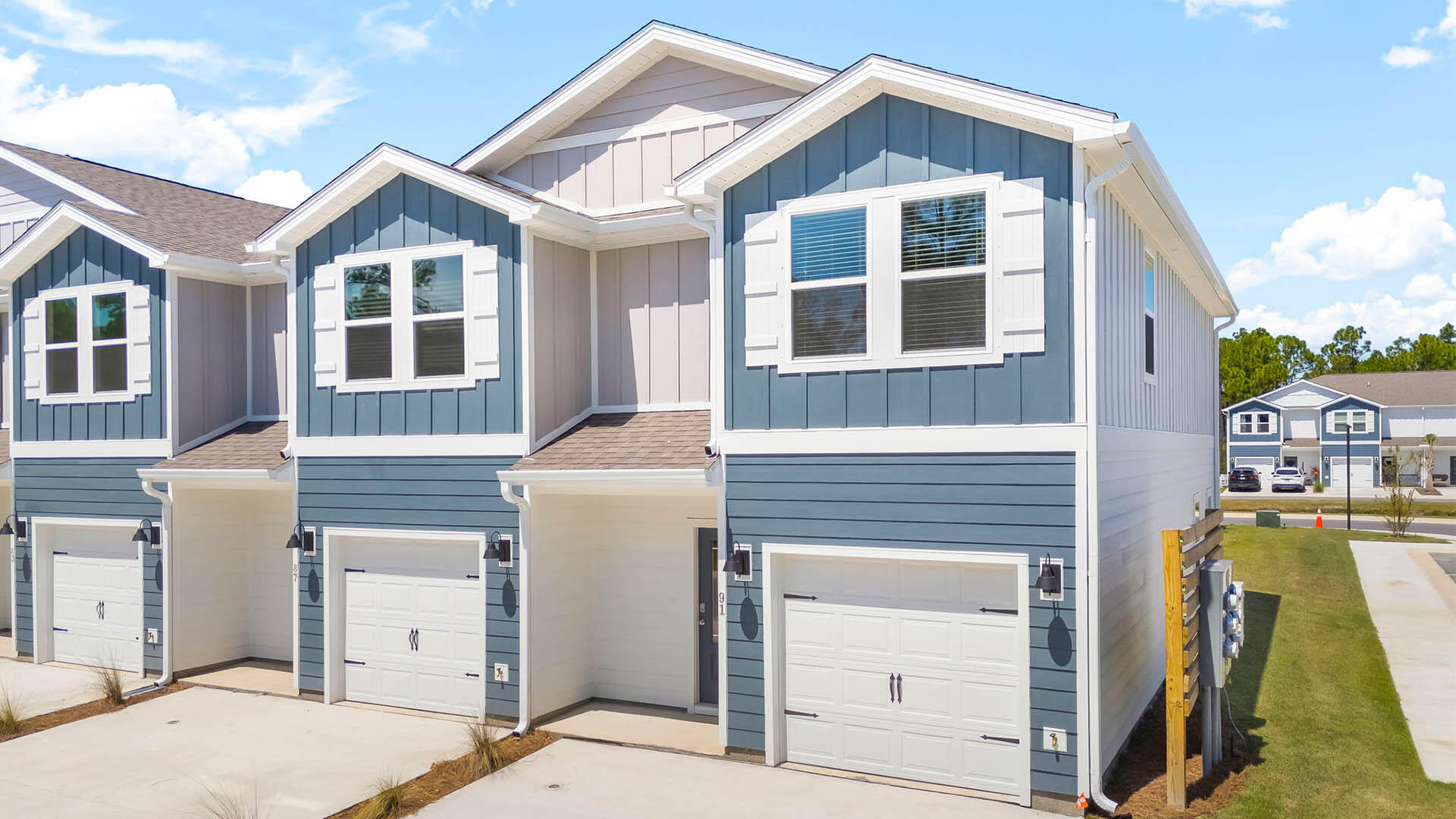 Welcome to Hawk's Landing in Santa Rosa Beach, Florida. This two-story end unit townhome is situated at a corner lot and is under construction and has 3 bedrooms, 2.5 bathrooms and is an end unit.  As you enter this home you will find EVP flooring in the foyer leading to the expansive open-concept kitchen, living, and dining area, designed for entertaining and everyday living. The kitchen is open and spacious with a center island. The kitchen features quartz countertops and premium stainless appliances including a smooth top stove, microwave and dishwasher. The living area is well illuminated with exterior windows and a glass door leading to the back patio.