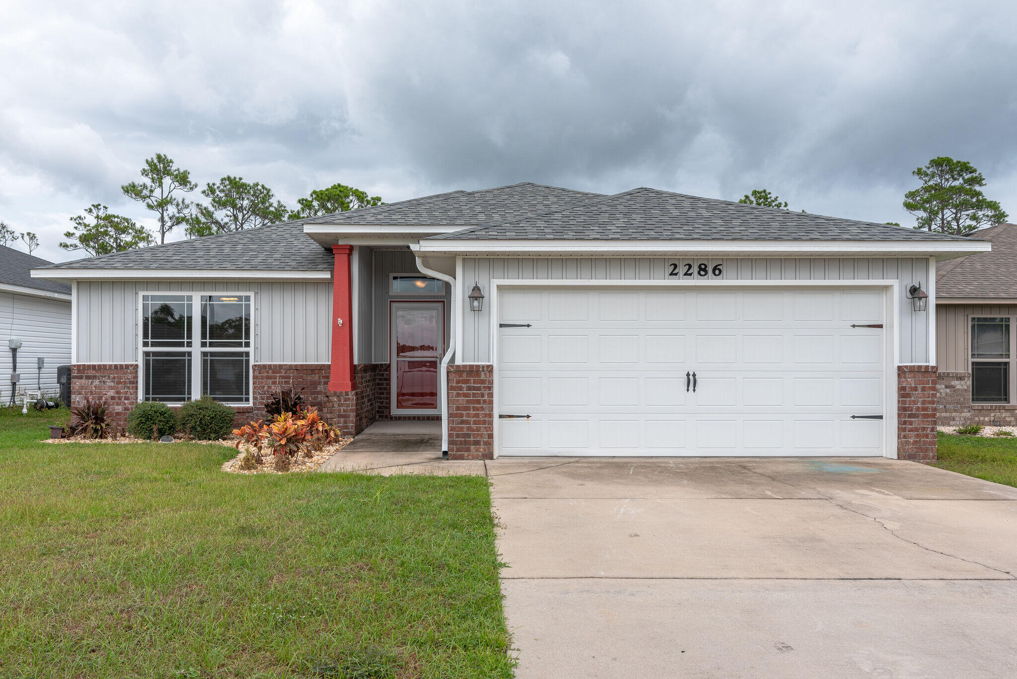 Navarre location!! This craftsman style 3-bedroom 2 bath 1475 sq. ft. home features an open floor plan with granite in the kitchen and stainless steel appliances. The kitchen is open with a breakfast bar that over looks the living room and breakfast nook with maple cabinets. There is also a large pantry and indoor laundry room. Double doors lead you into the master suite at the back of the home. The master bath features a large garden tub, separate shower, double sinks, and a walk-in closet. The other 2 bedrooms share the bathroom at the front of the home. No smoking. No cats. A smaller dog may be allowed with photo, approval and $400 non-refundable pet fee. Call to schedule a showing today!
