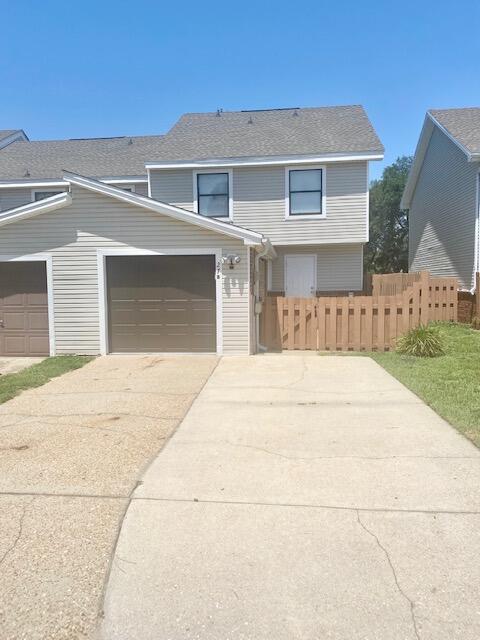 AVAILABLE: 7/13/22. SECURITY DEPOSIT = $1850. Tile throughout bottom floor. Carpet & vinyl upstairs. Kitchen has stainless steel appliances, pantry & the utility closet. HUGE living room w/ crown molding & wood looking tiled floors. 1/2 bath downstairs for guests. Storage under stairs, in pull down stairs attic storage & in the 1 car garage. Garage has shelving & auto opener. All the bedrooms are upstairs. Master has a walk in closet. View of courtyard/pool from the additional bedrooms. Large community courtyard w/ bathrooms, outdoor shower & swimming pool. Ceiling fans in all the rooms. All electric! Close & convenient to bases, shopping, etc. Sorry, no pets/no smoking.